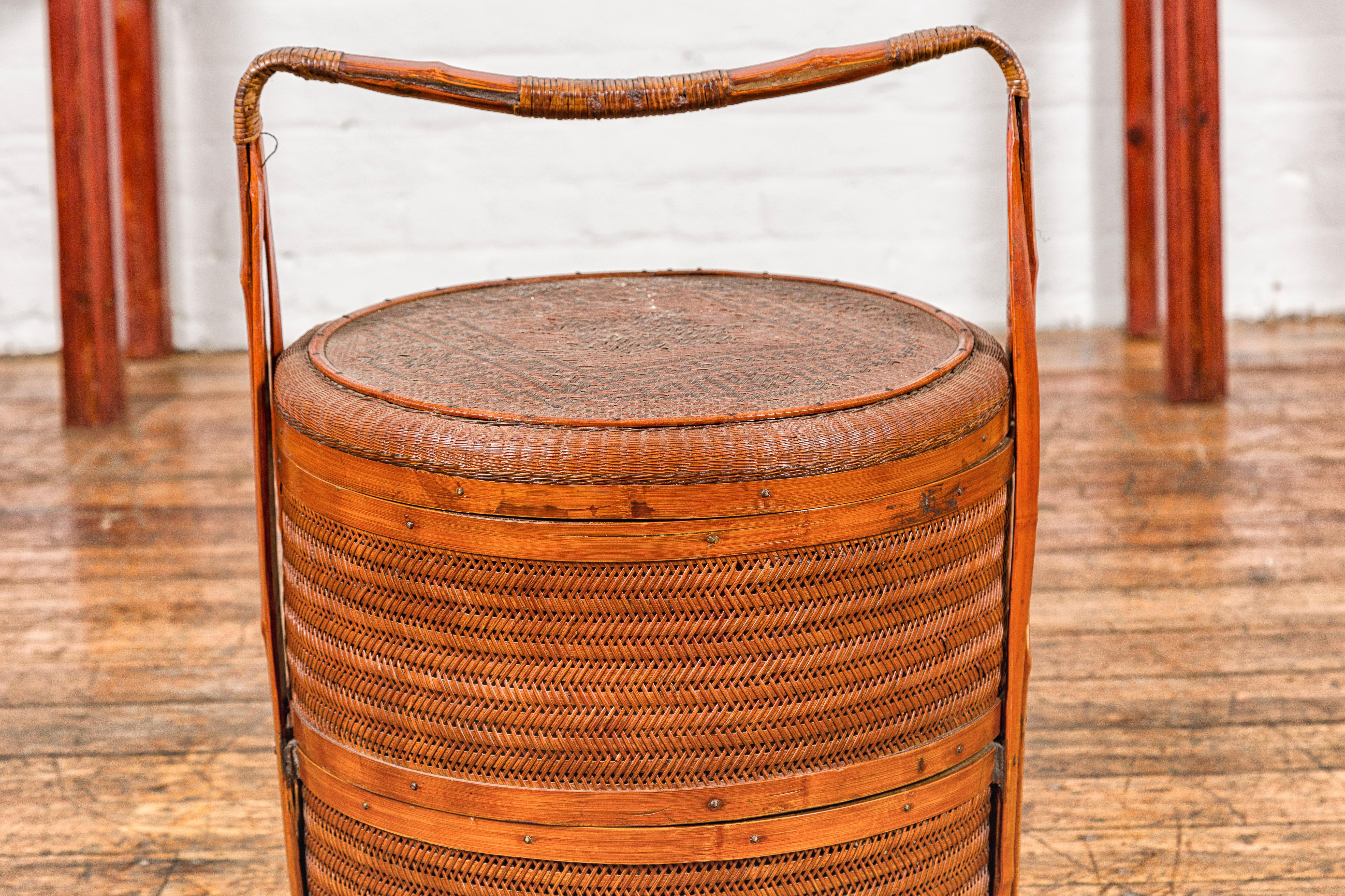 Chinese Two-Tiered Bamboo and Rattan Lidded Food Basket with Large Handle In Good Condition For Sale In Yonkers, NY