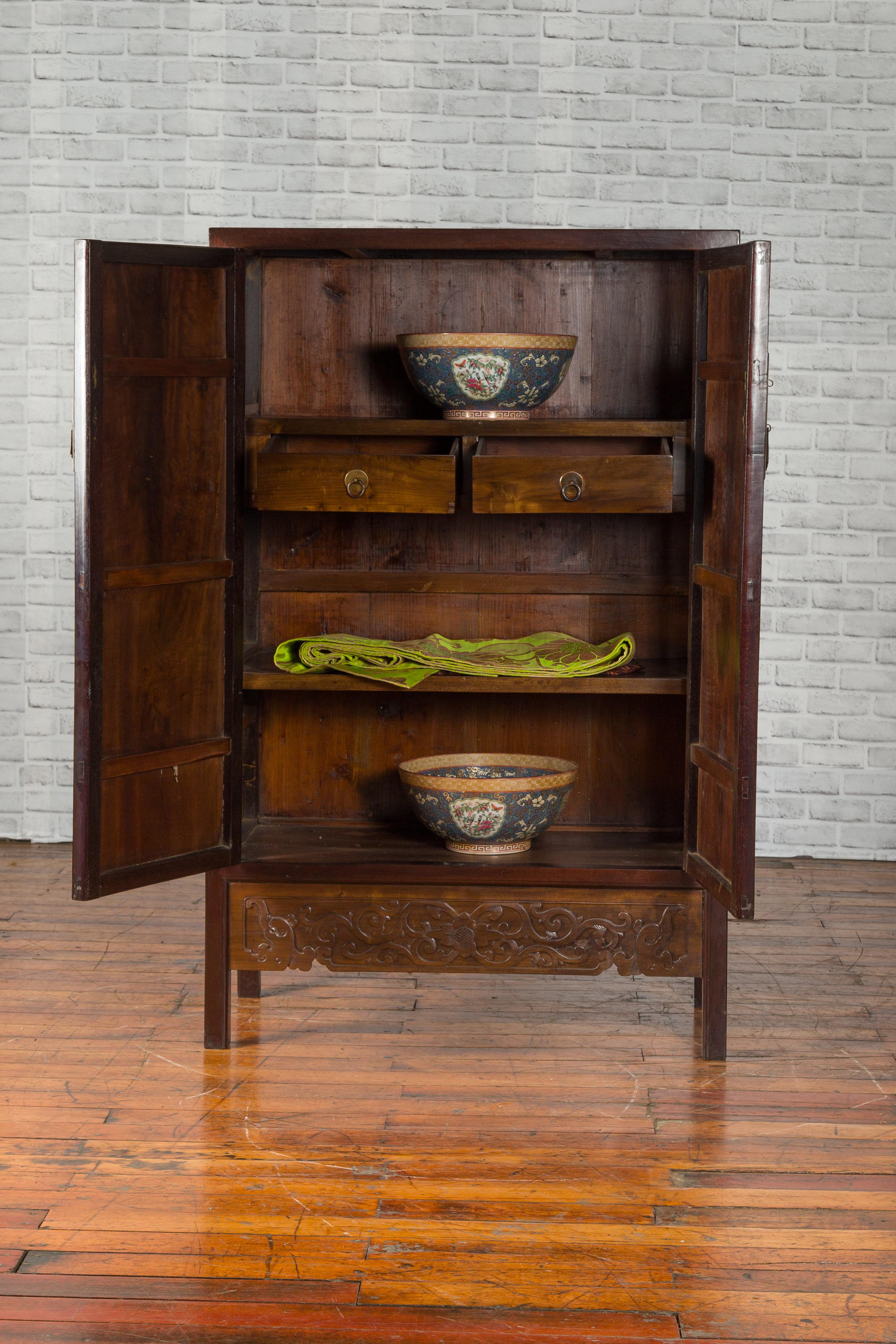 Wood Chinese Two-Toned Early 20th Century Cabinet with Carved Apron and Inner Drawers For Sale