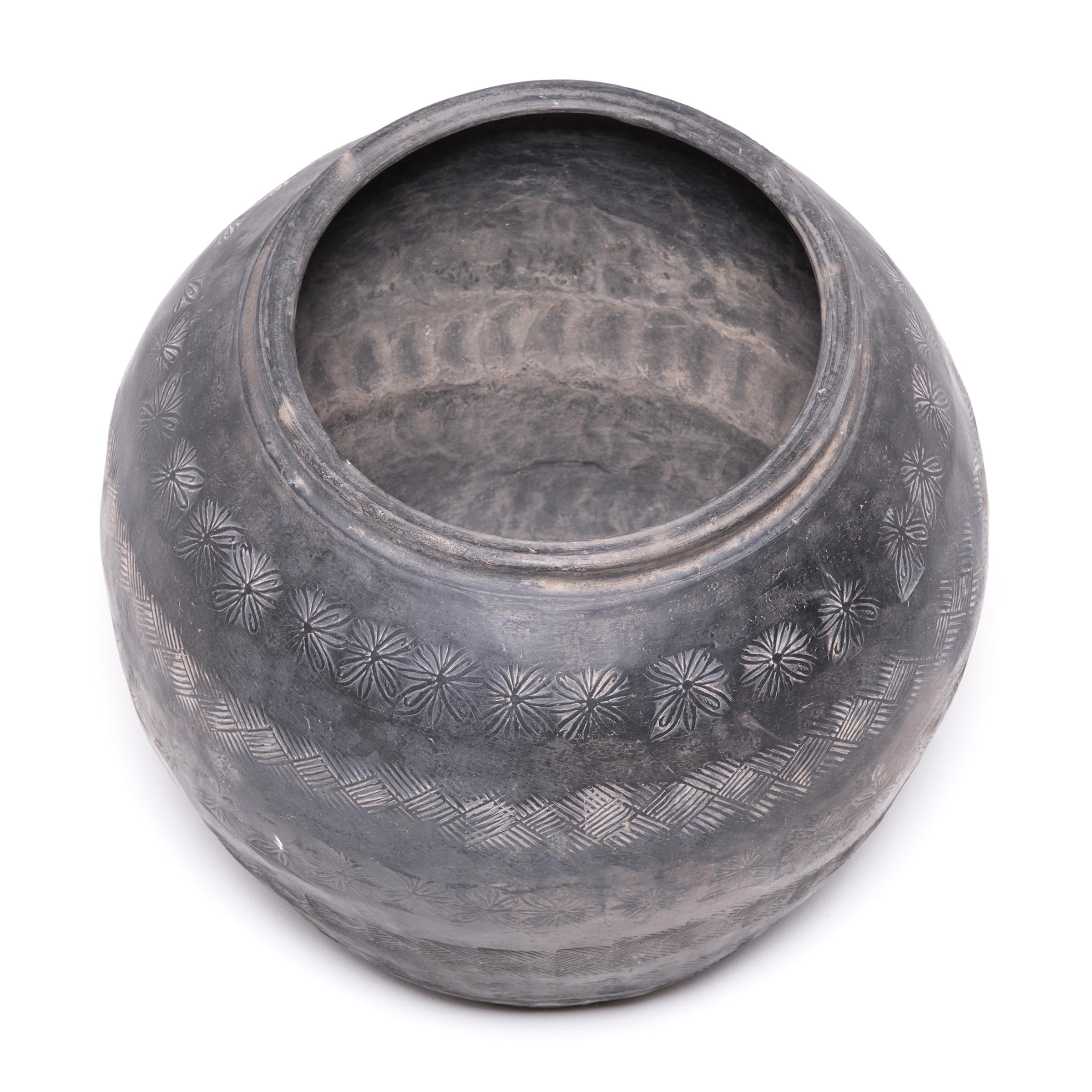 Blackened Chinese Unglazed Stamped Clay Jar