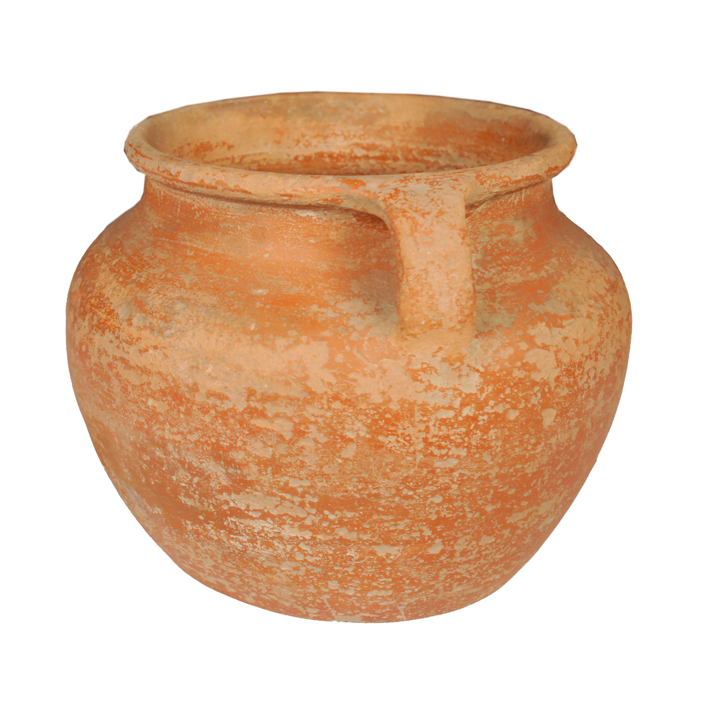 Based on prototypes fired in ancient Chinese kilns, this jar's perfect proportions haven't changed much since the Bronze Age. Keeping in the tradition of its predecessors, this early 20th century ceramic vessel is glazed with a slip of red clay,