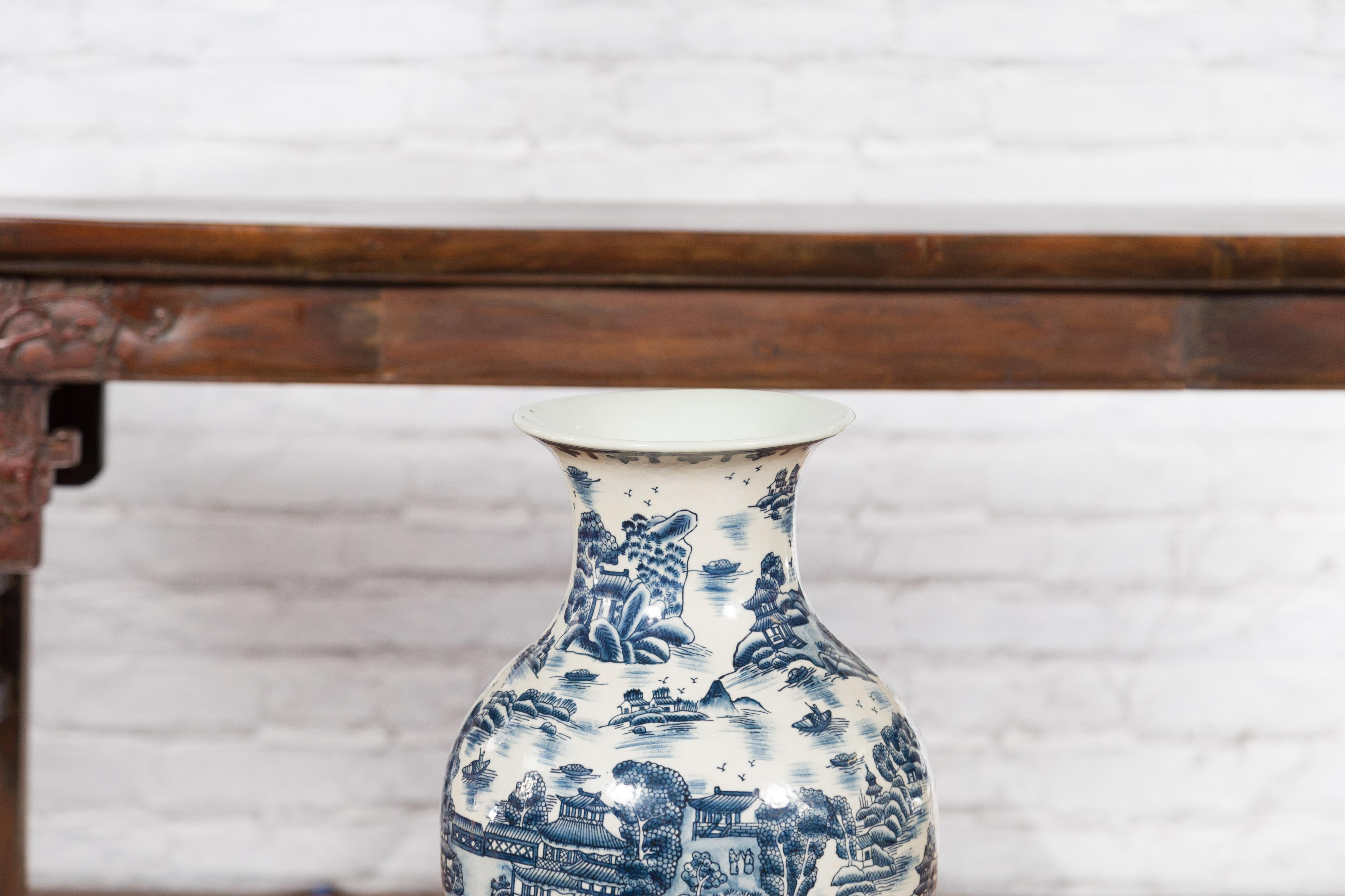 Hand-Painted Chinese Vintage Blue and White Porcelain Vase with Landscapes and Architectures For Sale