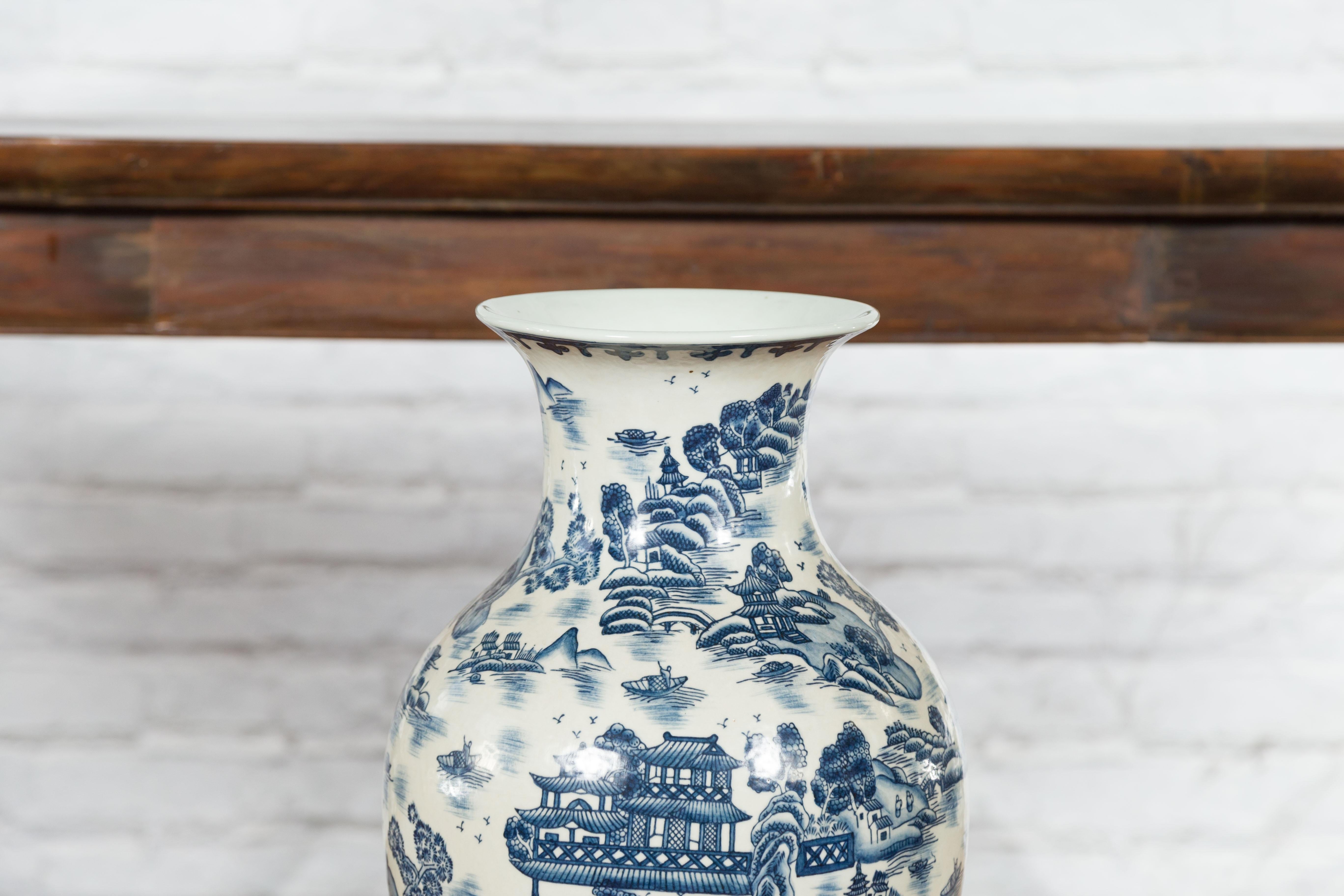 Hand-Painted Chinese Vintage Blue and White Porcelain Vase with Landscapes and Architectures For Sale