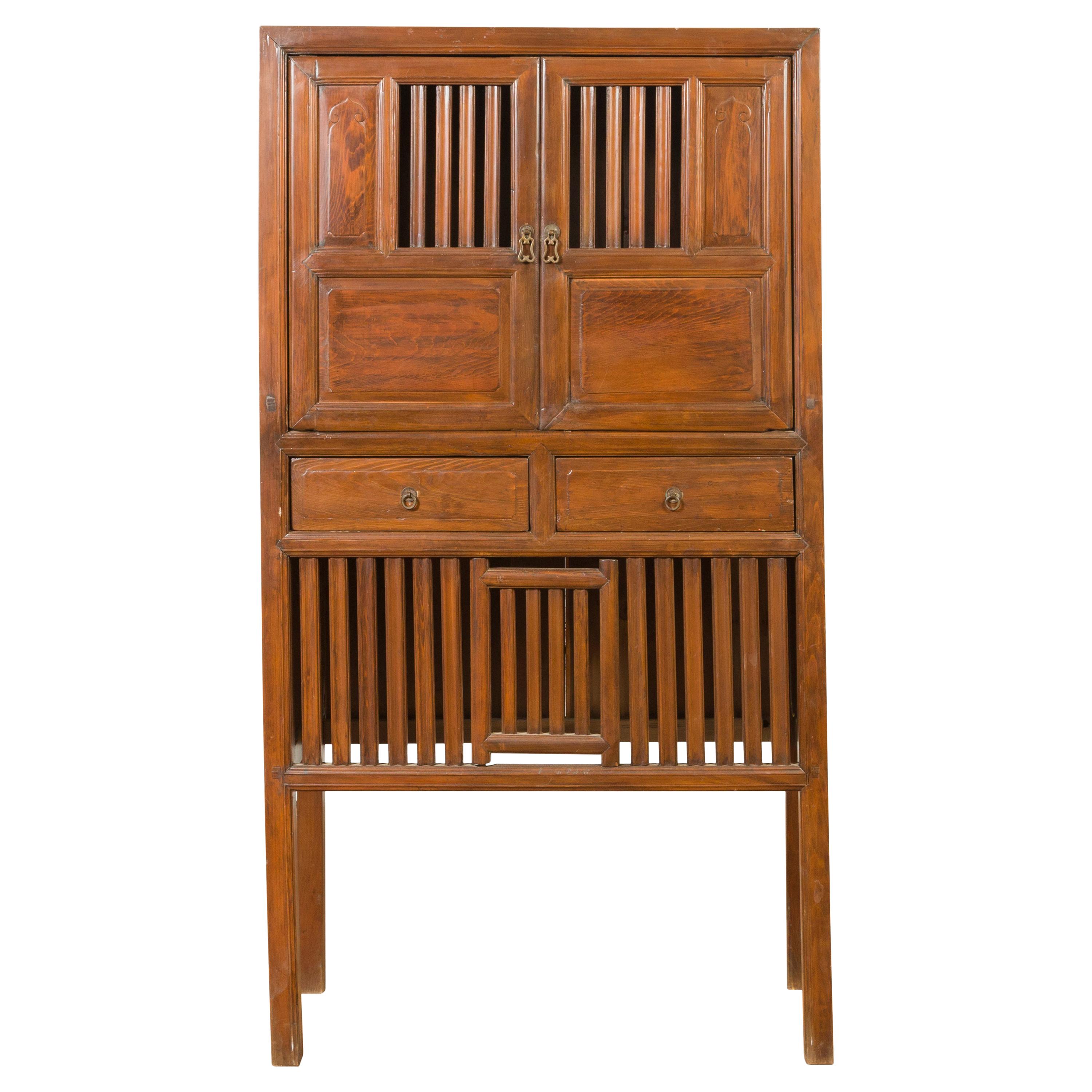 Chinese Vintage Cabinet with Fretwork Design, Doors and Drawers For Sale