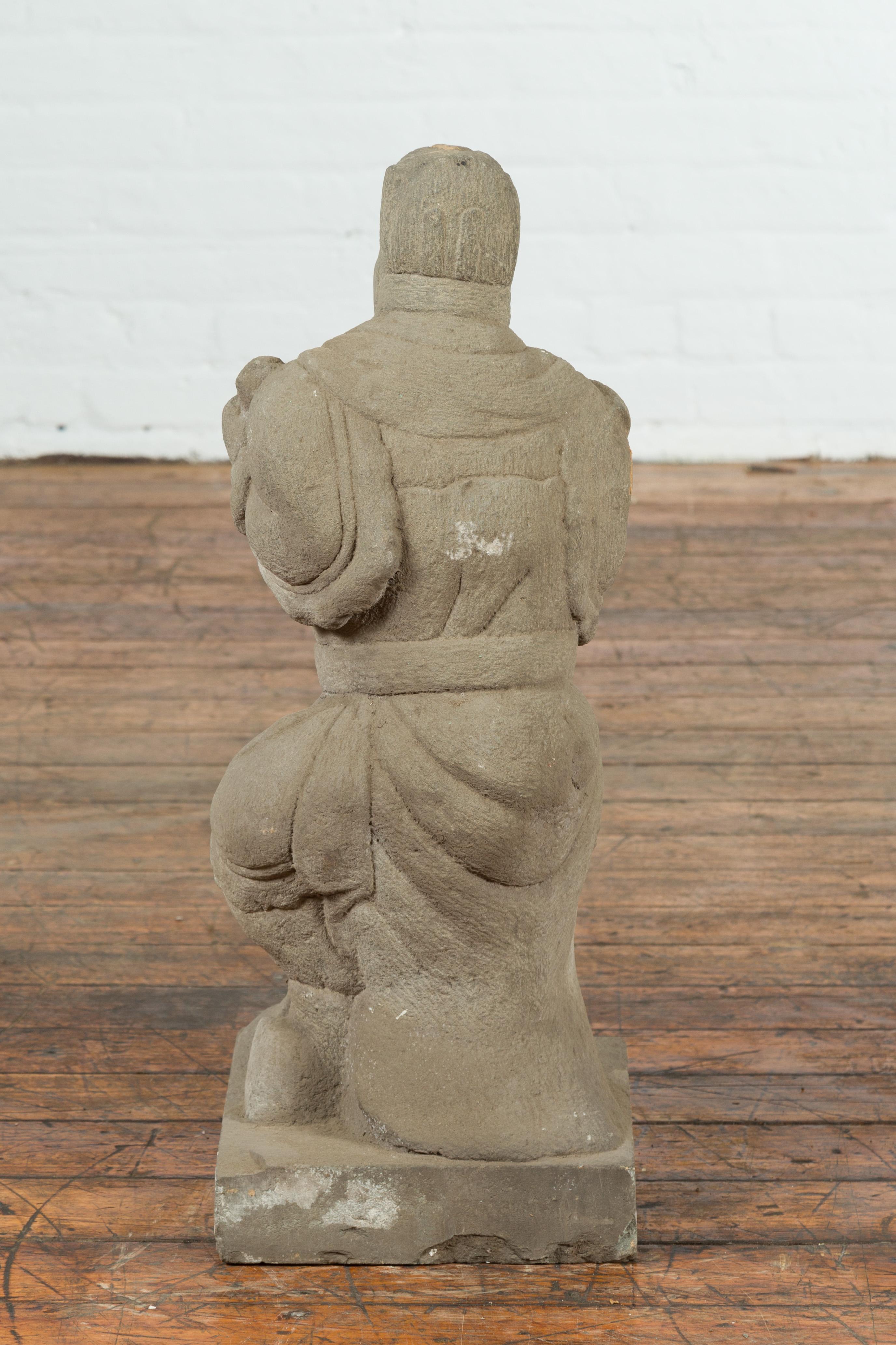 Chinese Vintage Carved Stone Sculpture Depicting a Seated Monk Holding Objects For Sale 6