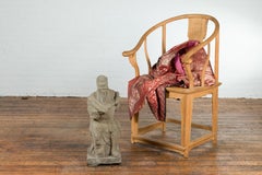 Chinese Vintage Carved Stone Sculpture Depicting a Seated Monk Holding Objects