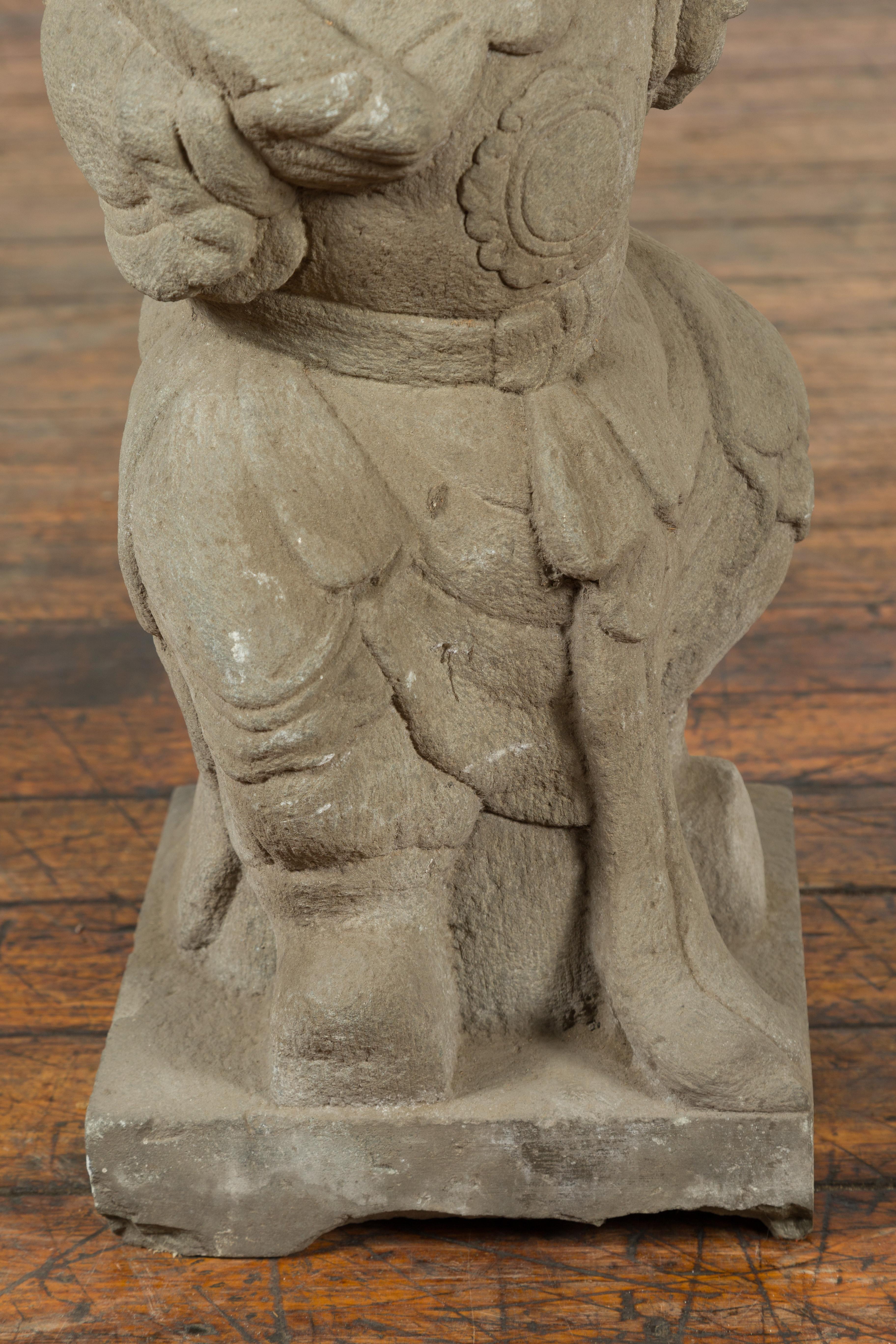 Chinese Vintage Carved Stone Sculpture Depicting a Seated Monk Holding Objects For Sale 2