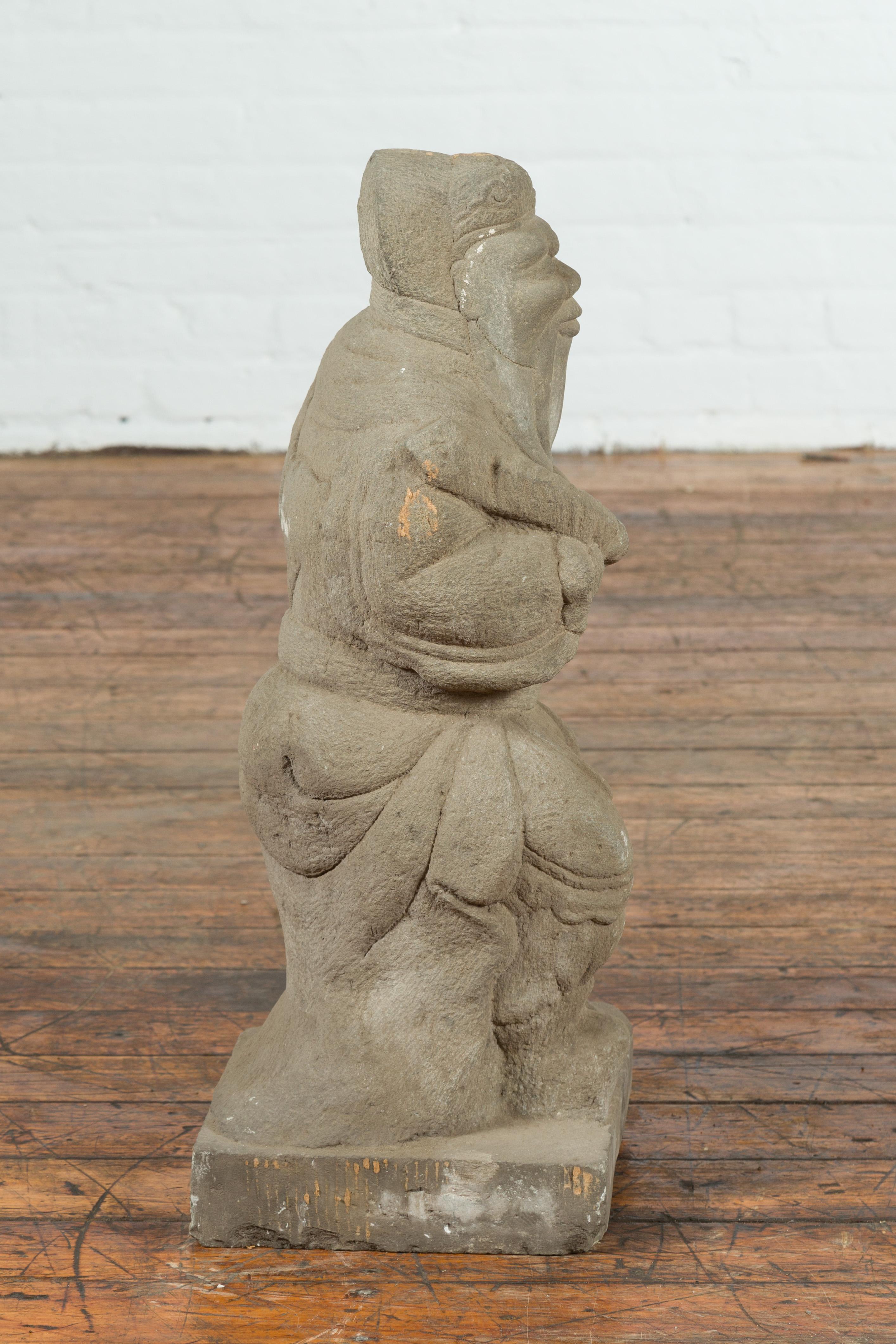 Chinese Vintage Carved Stone Sculpture Depicting a Seated Monk Holding Objects For Sale 5