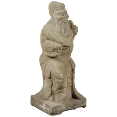 Chinese Vintage Carved Stone Sculpture Depicting a Seated Monk Holding Objects