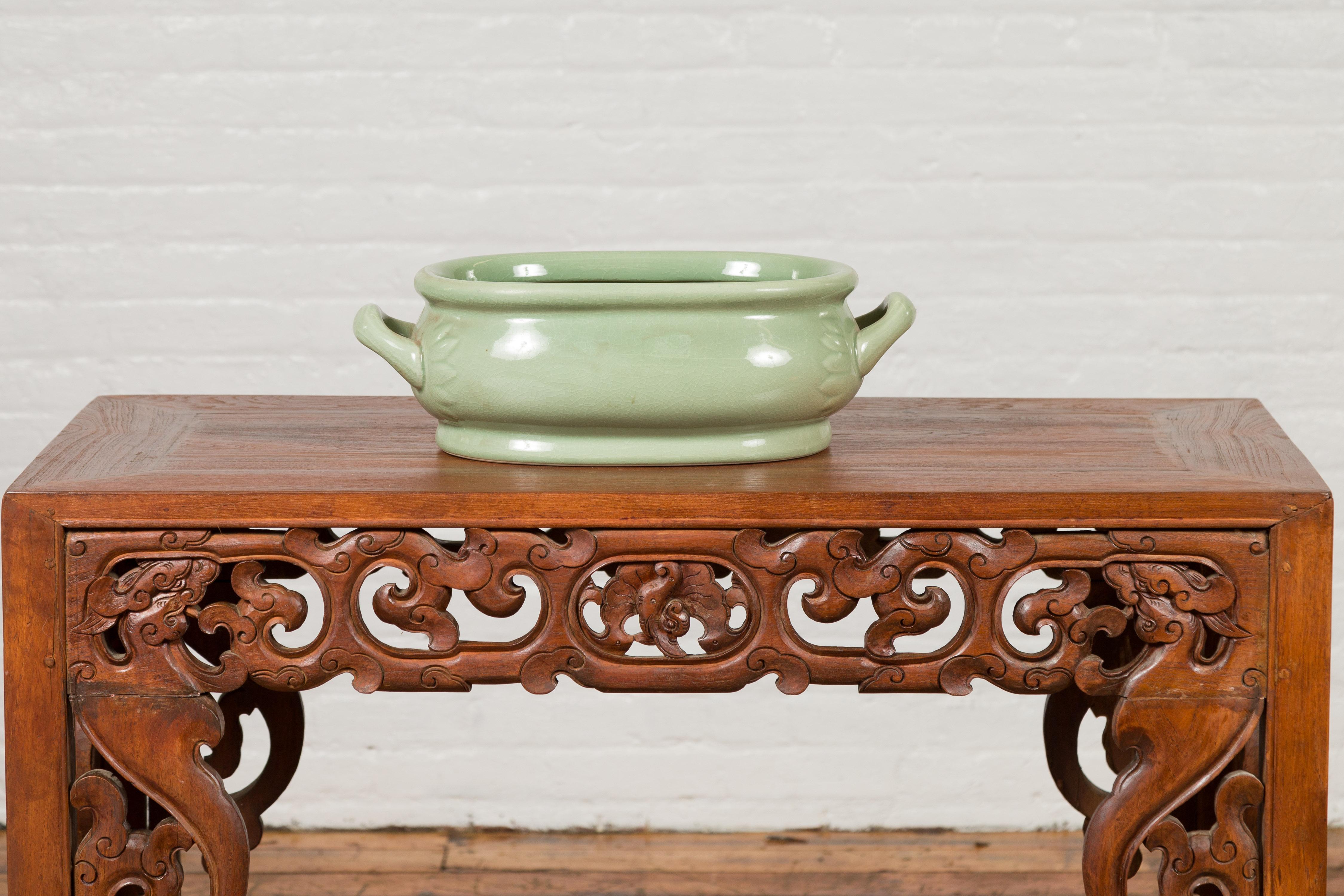 Chinese Vintage Celadon Foot Bath with Two Handles and Foliage Motifs 5