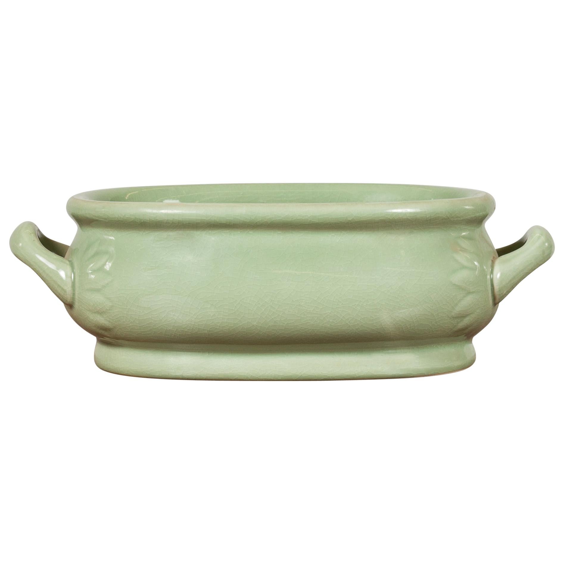 Chinese Vintage Celadon Foot Bath with Two Handles and Foliage Motifs For Sale
