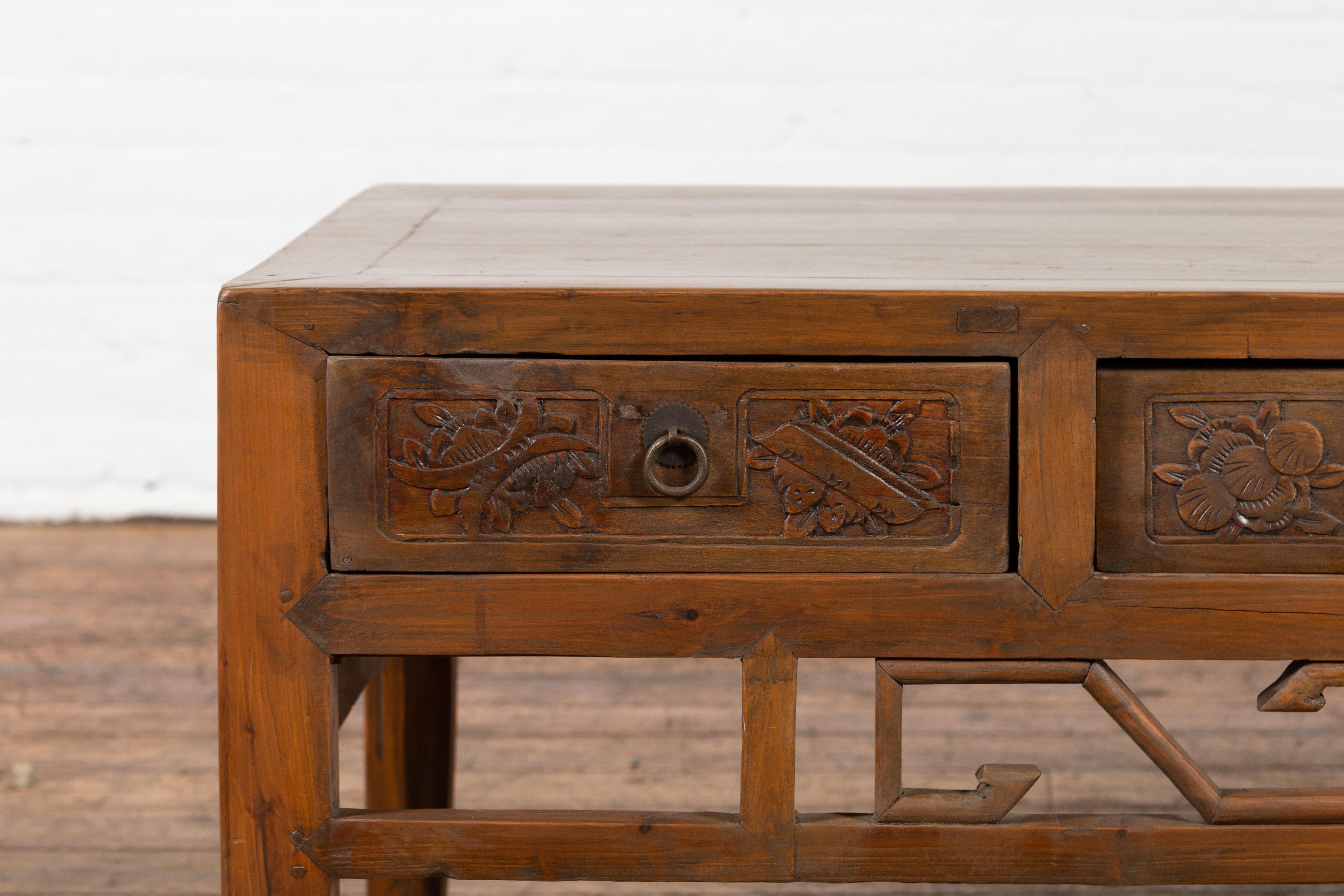 20th Century Chinese Vintage Coffee Table with Three Carved Drawers and Openwork Apron For Sale