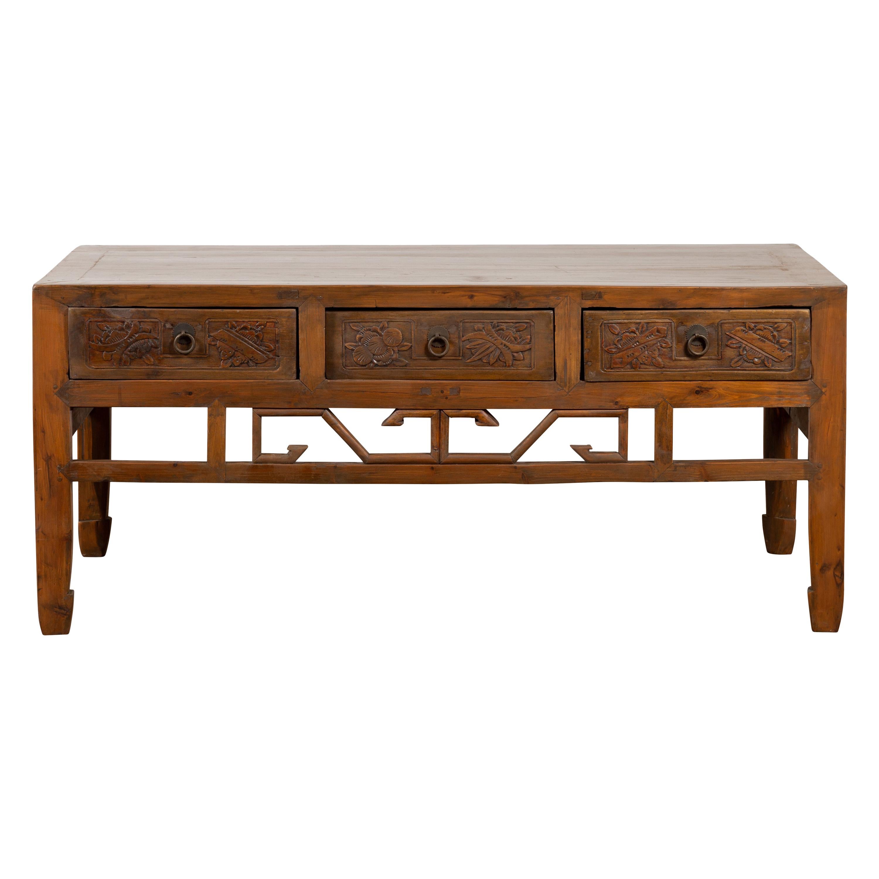 Chinese Vintage Coffee Table with Three Carved Drawers and Openwork Apron For Sale