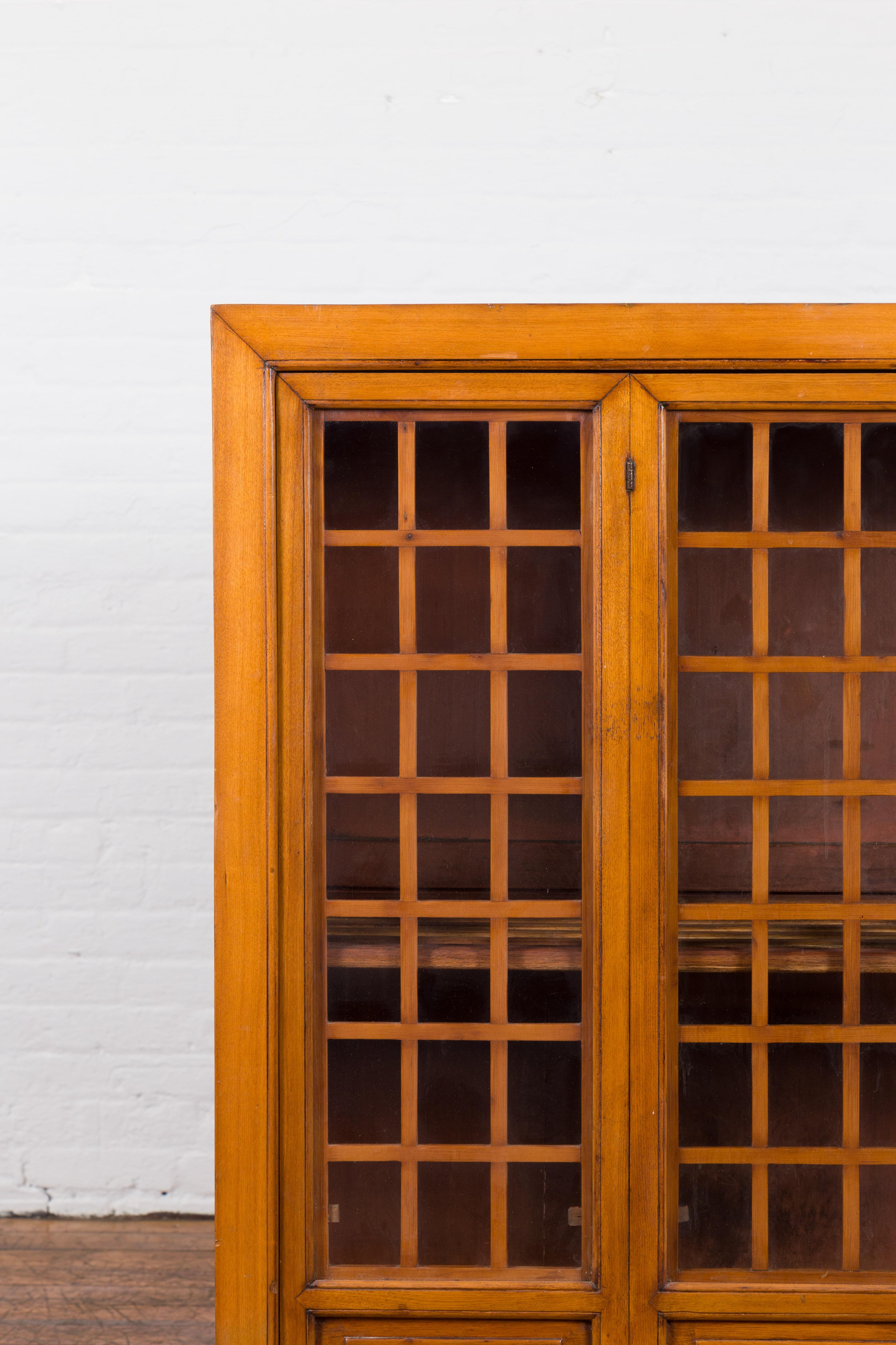 Chinese Vintage Display Cabinet with Paneled Glass Doors and Four Drawers In Good Condition For Sale In Yonkers, NY