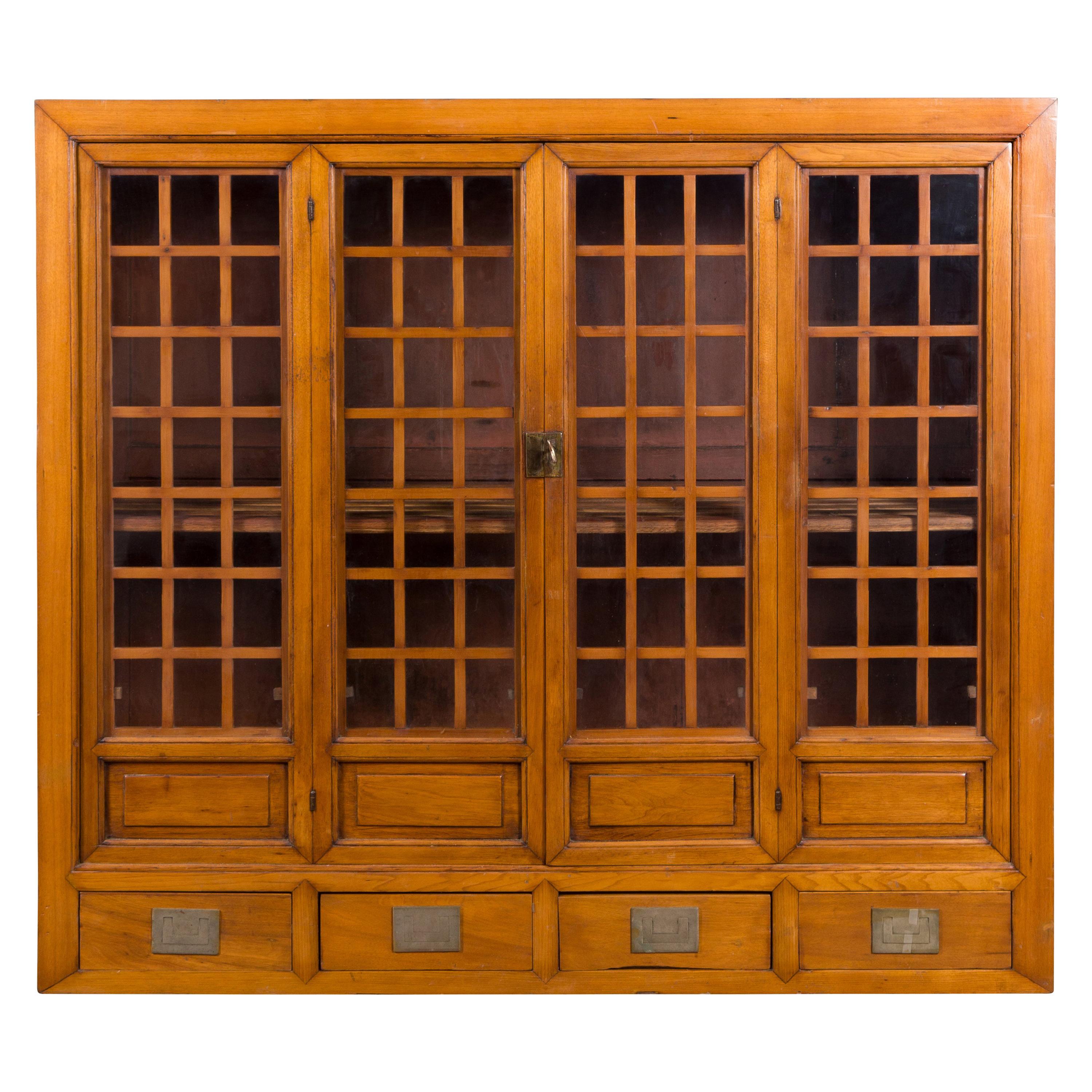 Chinese Vintage Display Cabinet with Paneled Glass Doors and Four Drawers For Sale