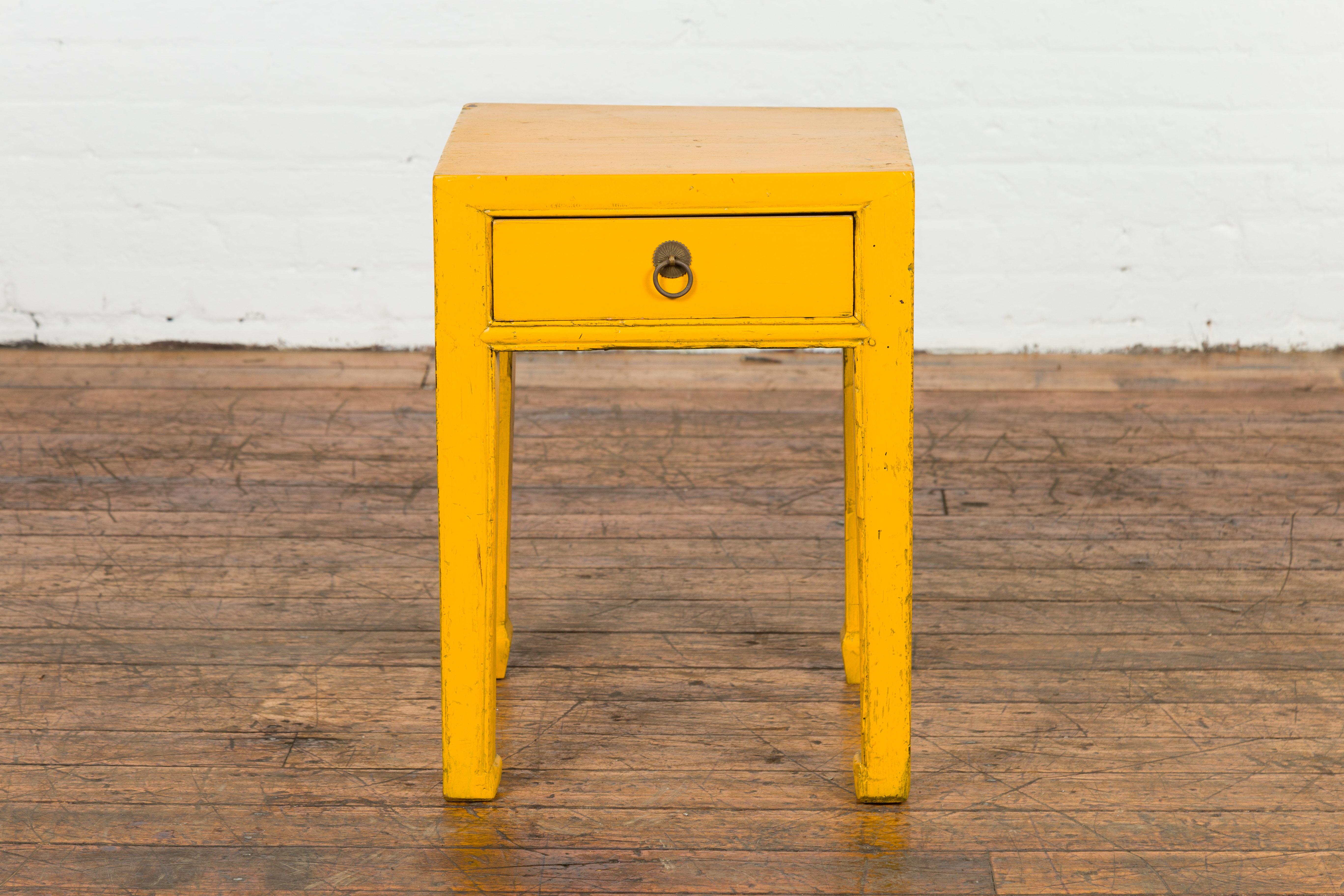 Mid-Century Modern Chinese Vintage Distressed Yellow Lacquer with Single Drawer and Horse Hoof Feet For Sale