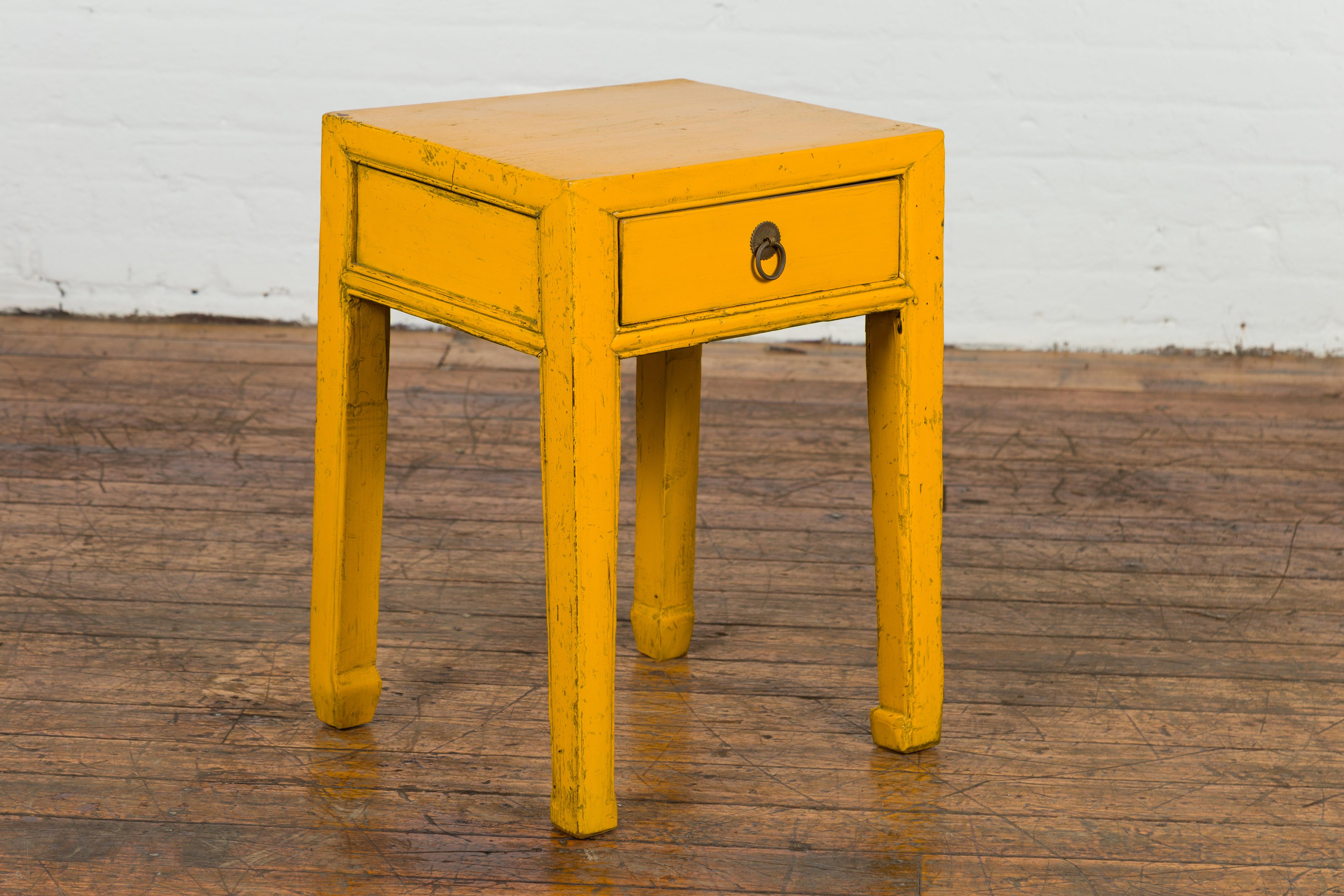 Chinese Vintage Distressed Yellow Lacquer with Single Drawer and Horse Hoof Feet For Sale 1
