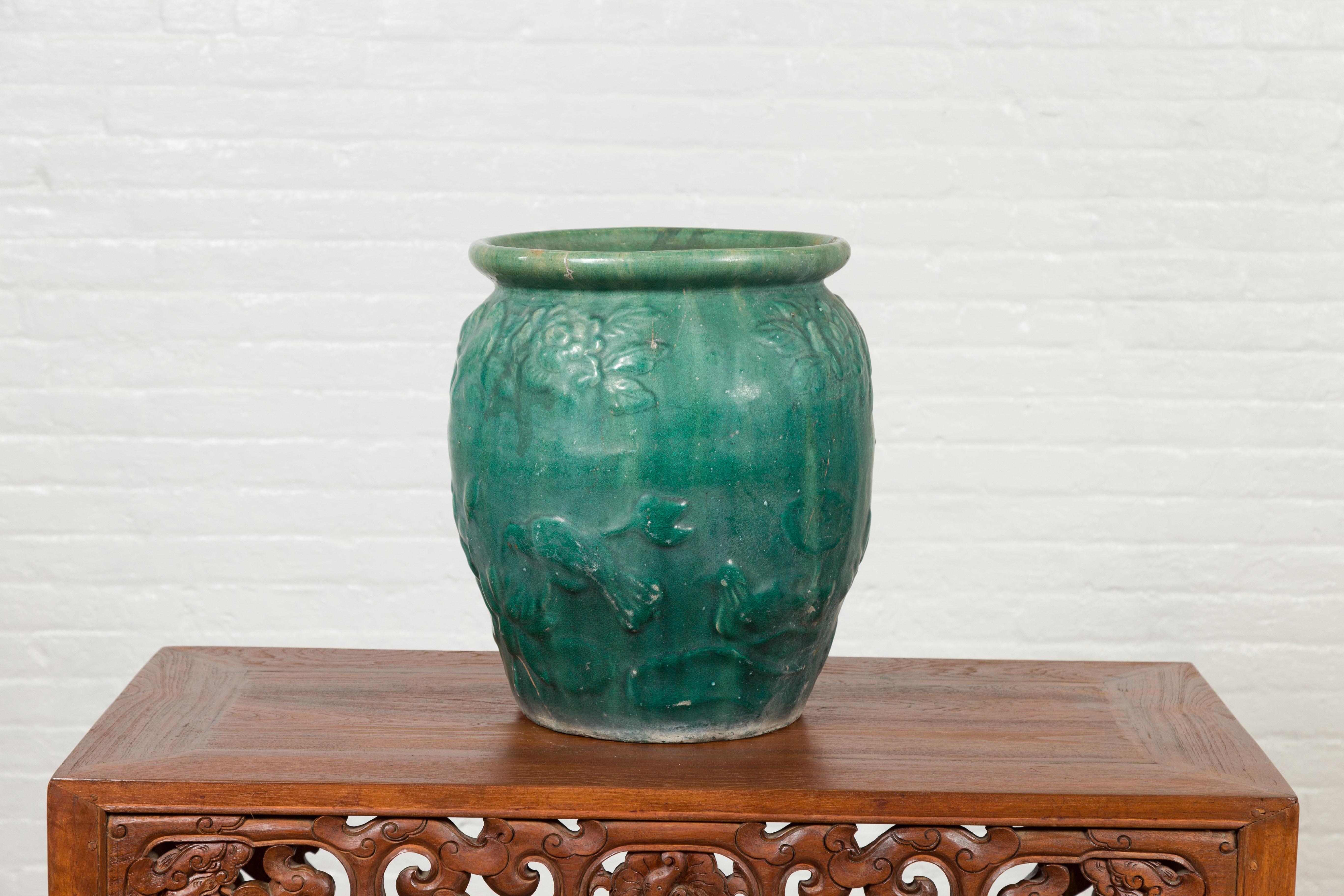 20th Century Chinese Vintage Green Glazed Vase with Raised Floral and Bird Motifs For Sale