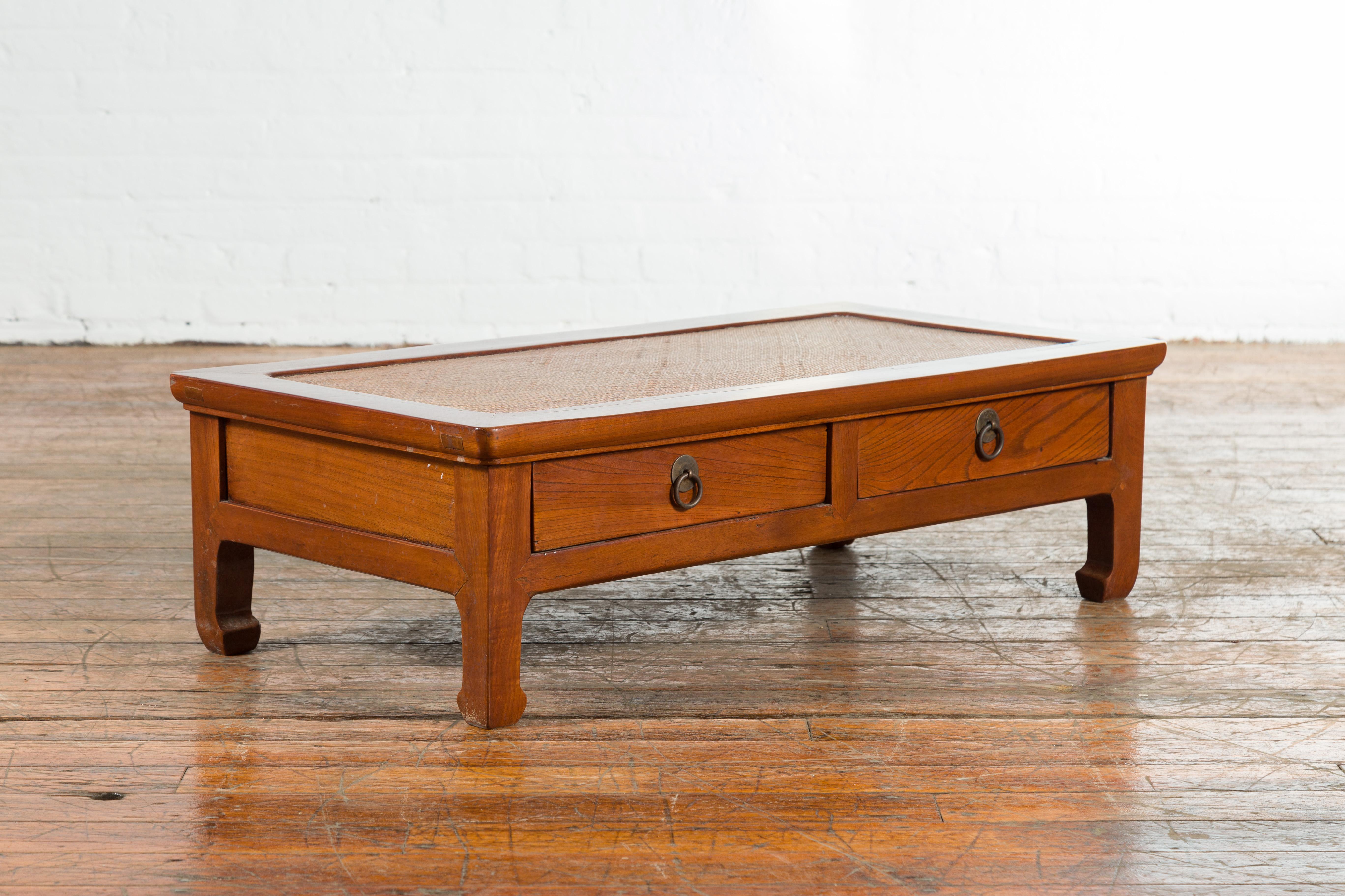20th Century Chinese Vintage Low Elmwood Table with Rattan Inset Top and Two Drawers For Sale