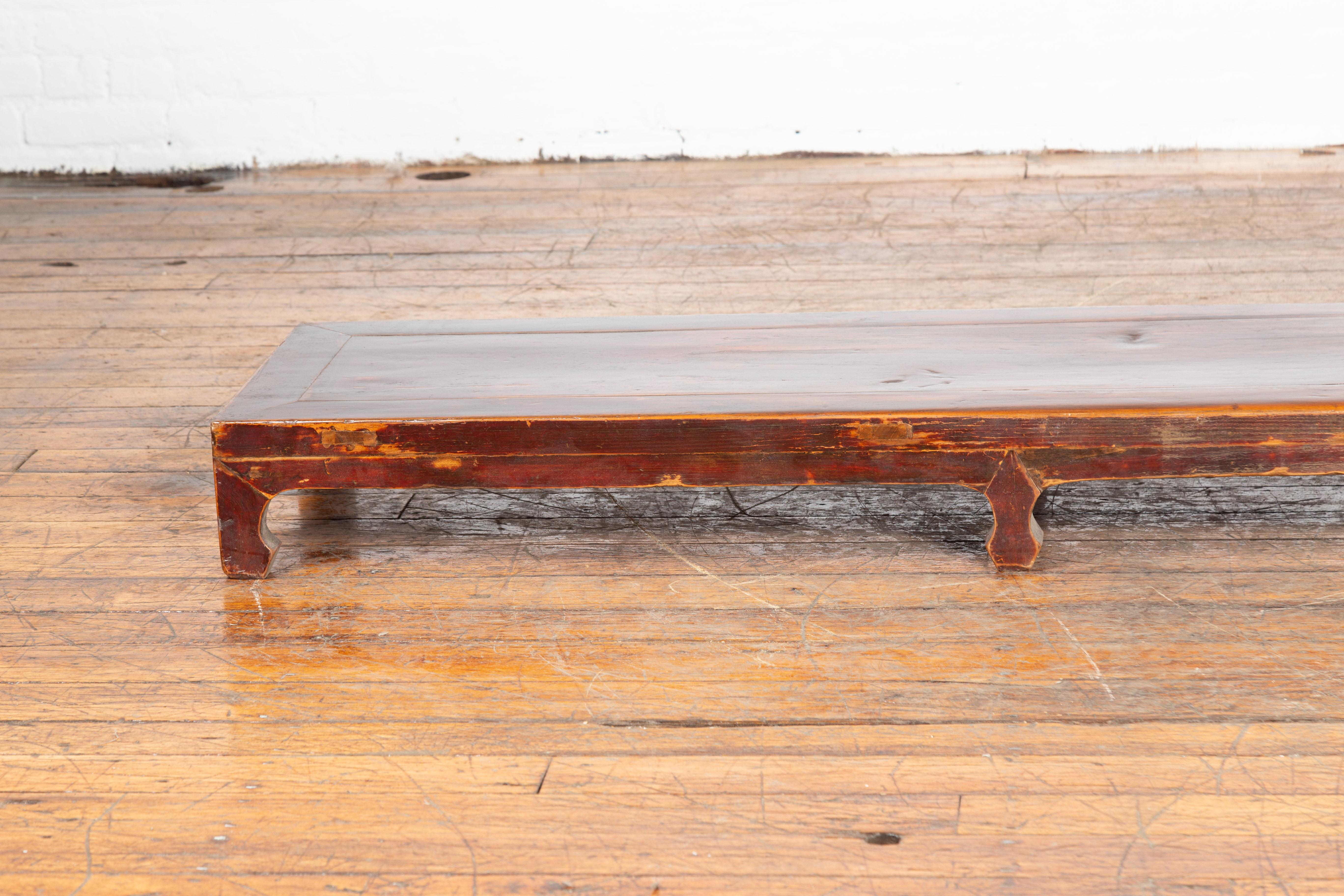 20th Century Chinese Vintage Low Kang Table with Distressed Patina and Carved Feet For Sale