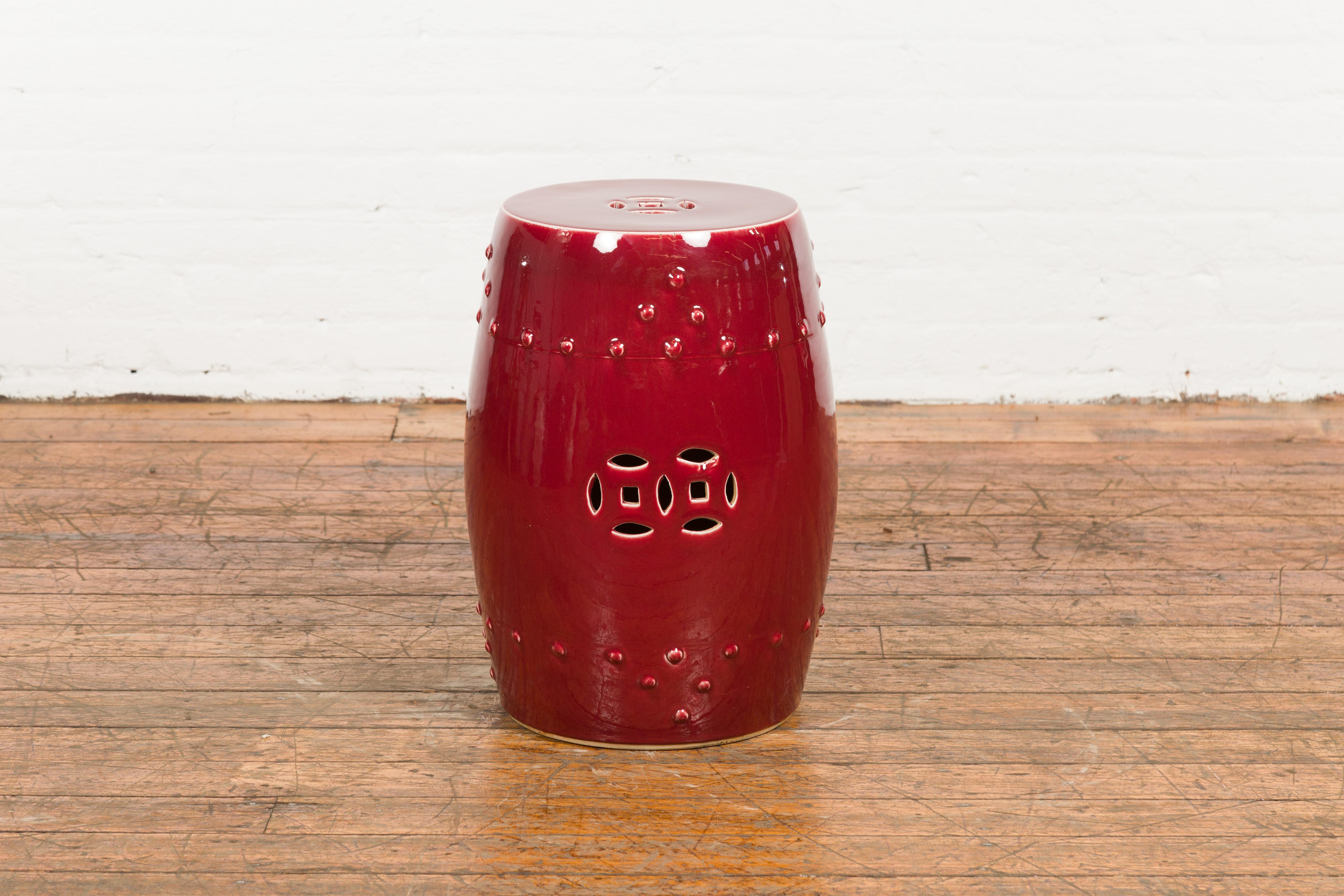 Chinese Vintage Oxblood Glazed Garden Stool with Pierced and Raised Motifs 7