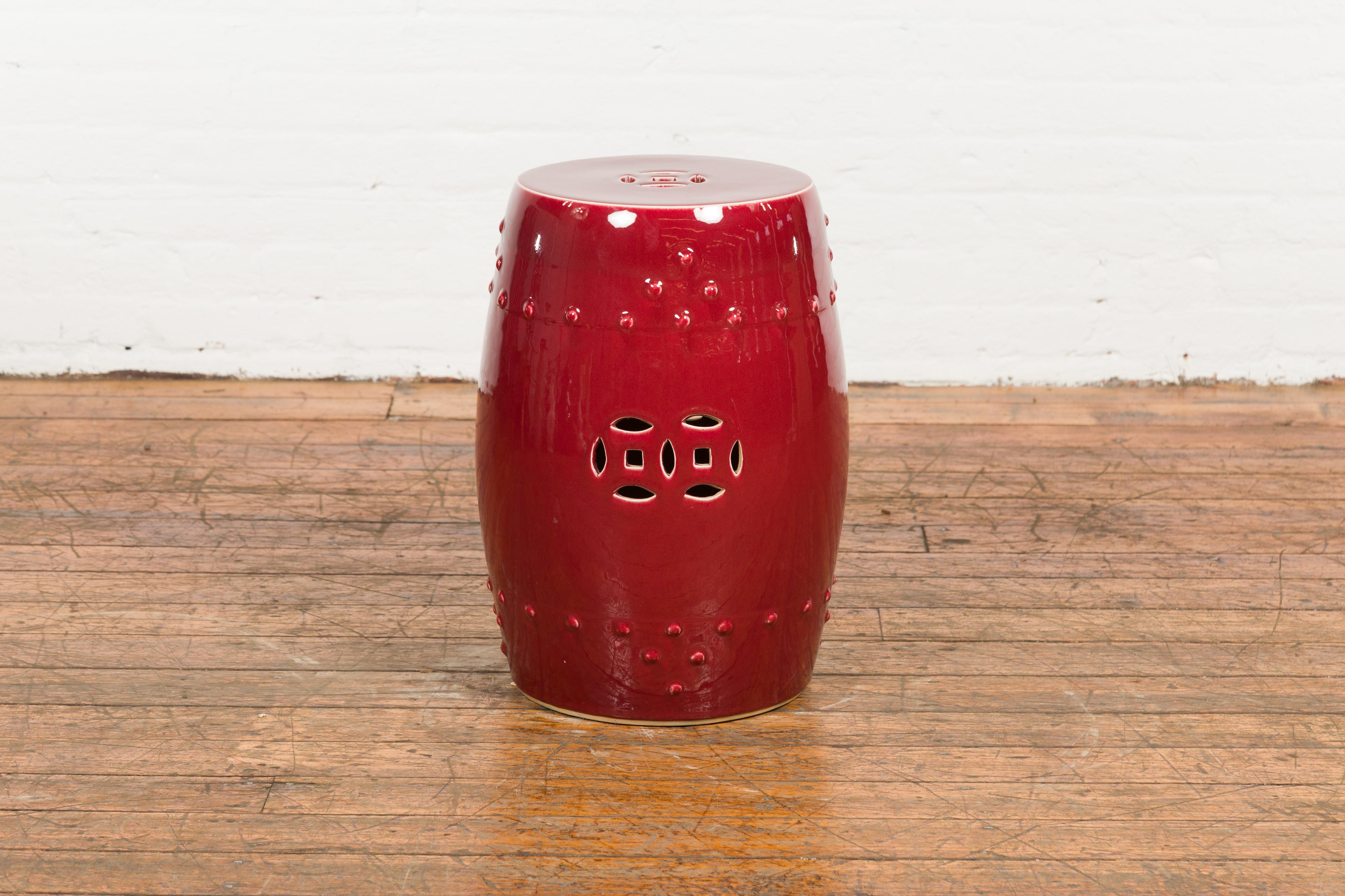 Chinese Vintage Oxblood Glazed Garden Stool with Pierced and Raised Motifs 9