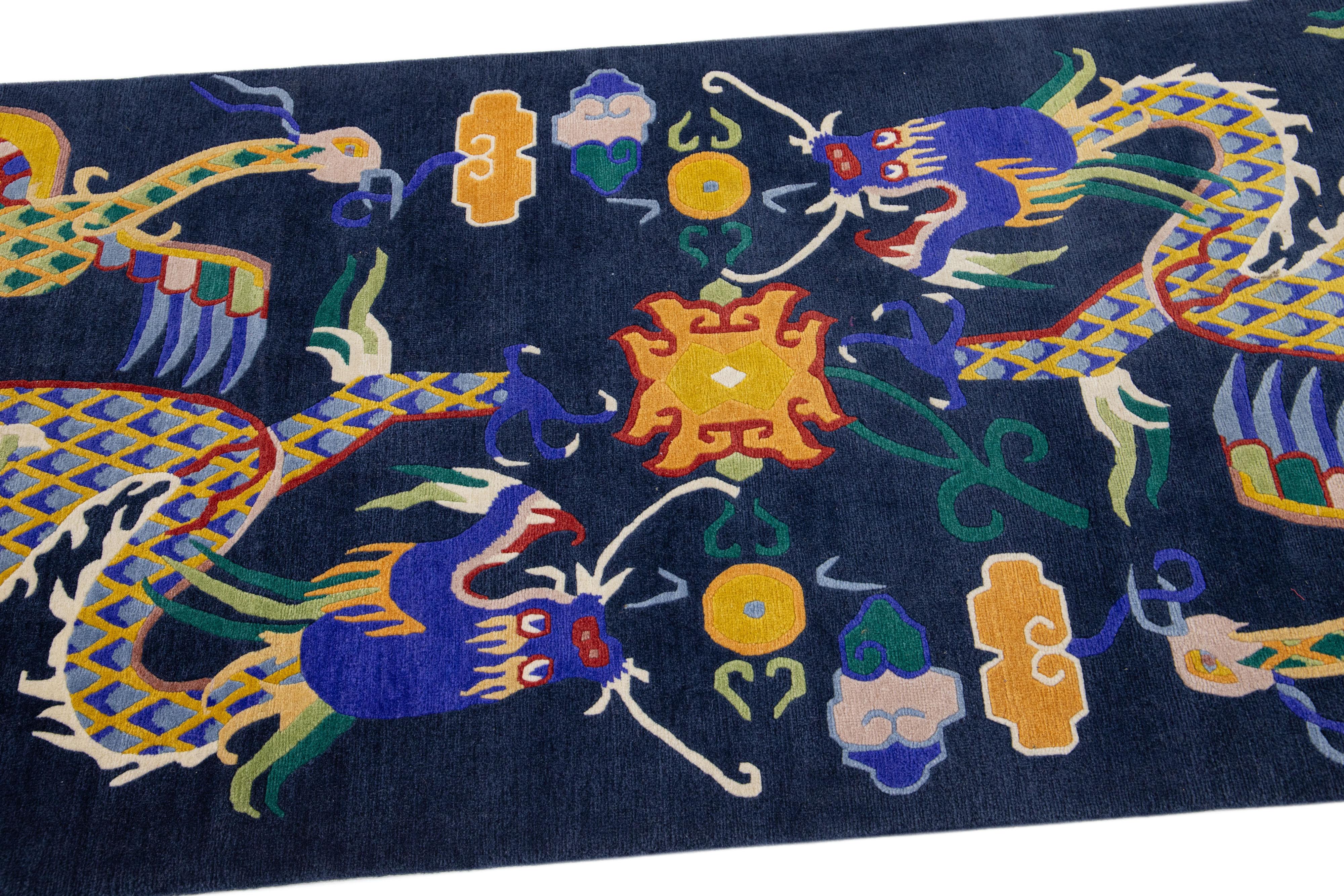 Tibetan Chinese Vintage Peking Blue Handmade Wool Rug with Mullticolor Dragon Motif For Sale