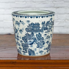 Vaso di porcellana d'epoca con paesaggio blu e bianco