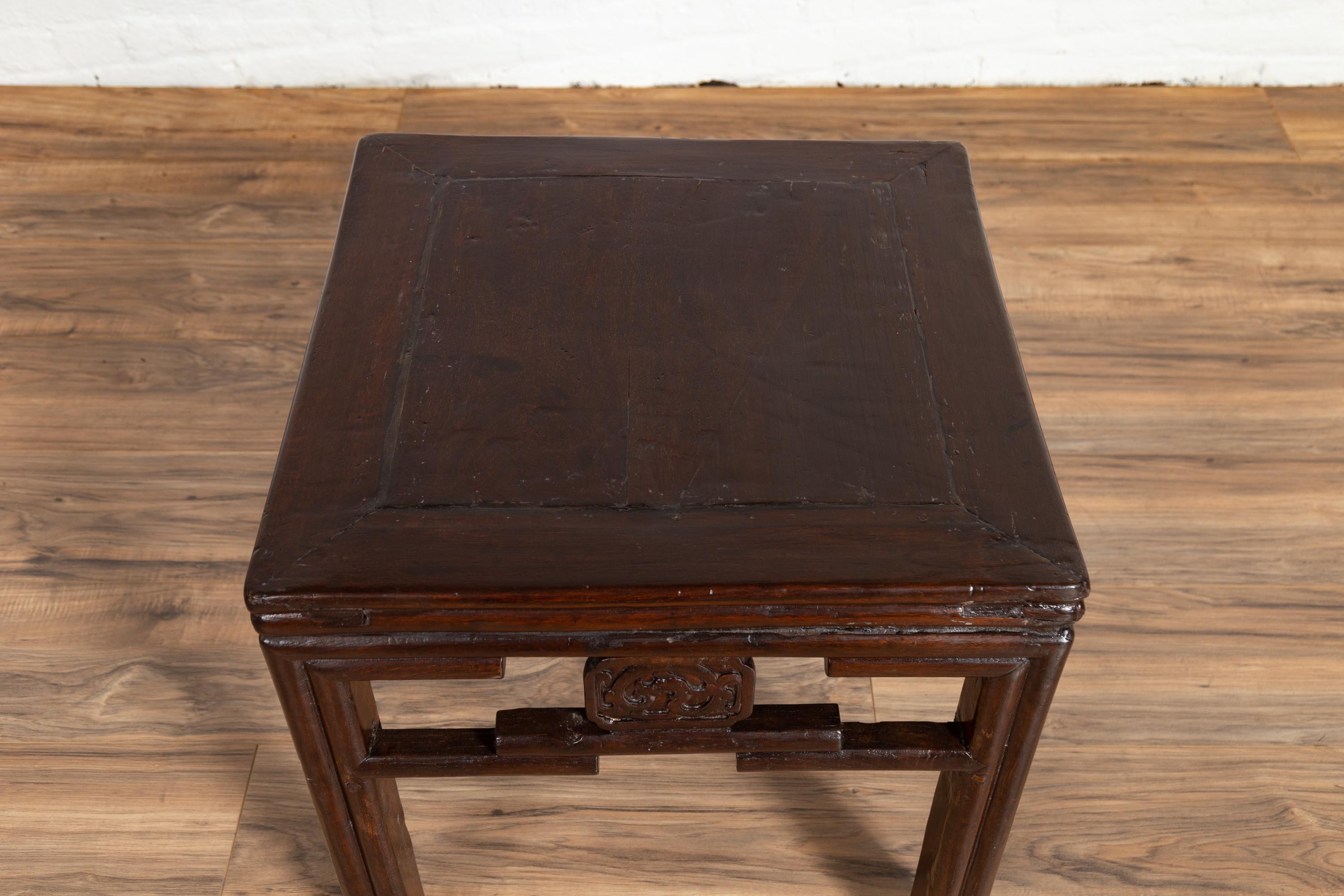 20th Century Chinese Vintage Qing Style Side Table with Dark Patina and Carved Medallions For Sale