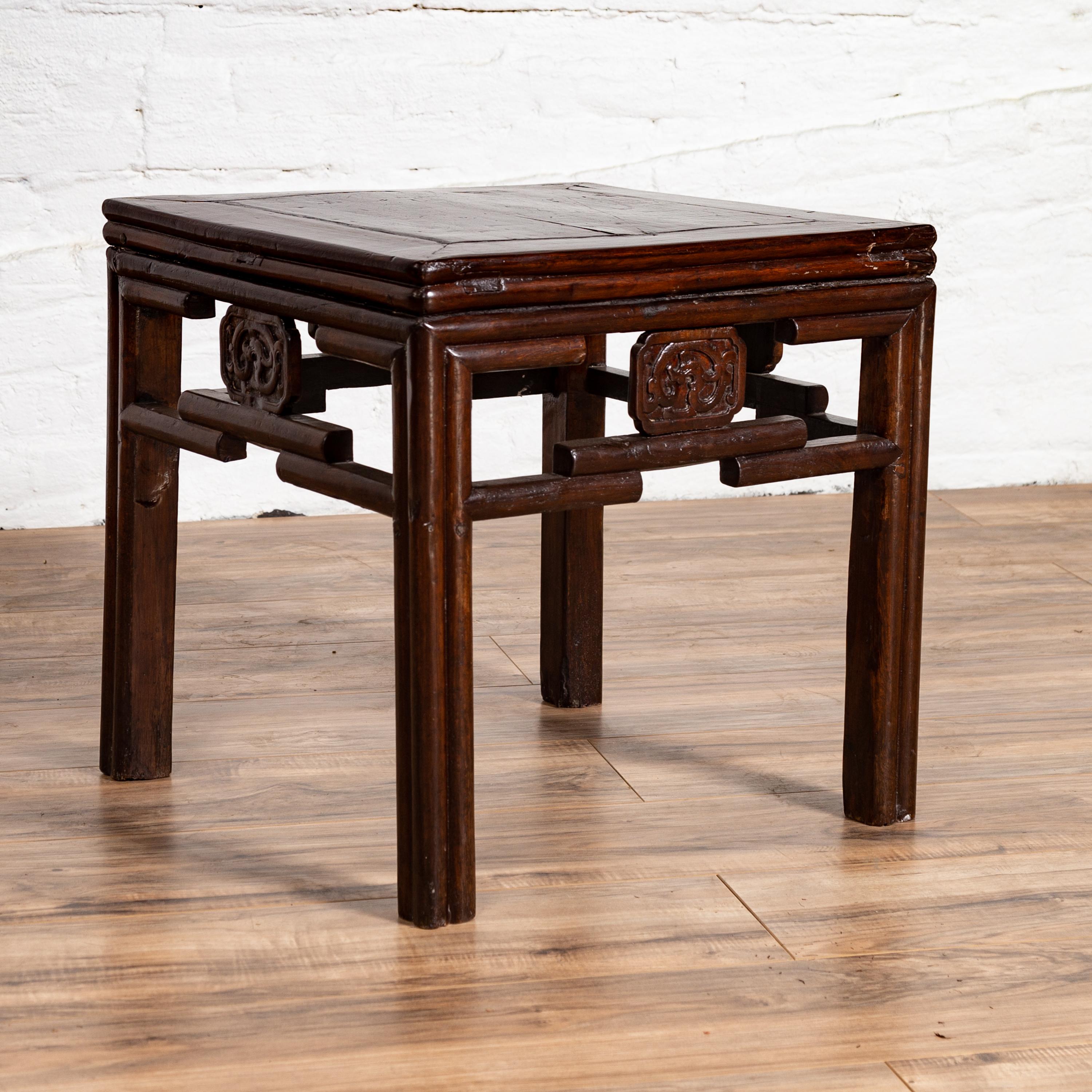 Wood Chinese Vintage Qing Style Side Table with Dark Patina and Carved Medallions For Sale