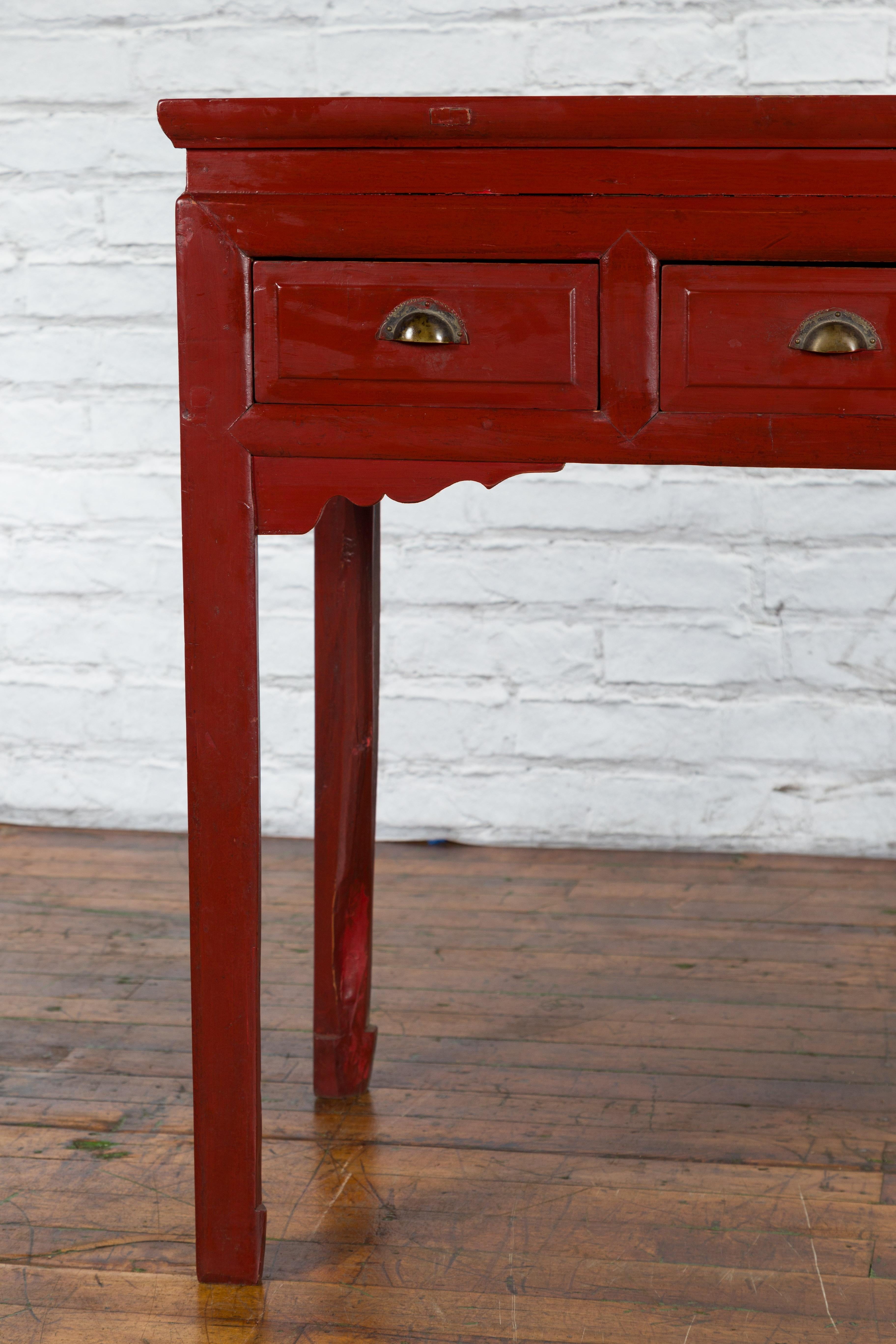 20th Century Chinese Vintage Red Lacquer Console Table with Drawers and Carved Spandrels For Sale