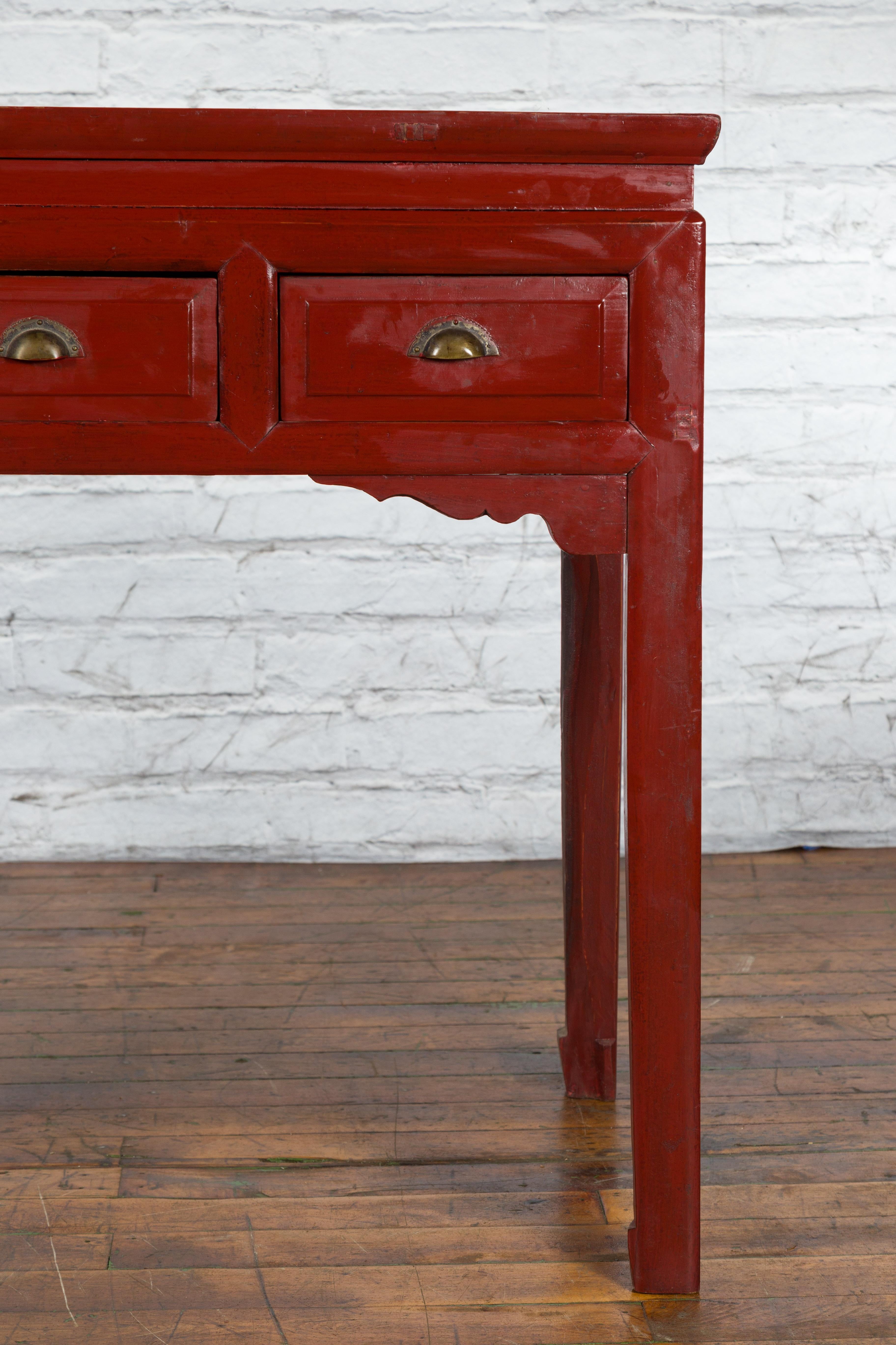 Wood Chinese Vintage Red Lacquer Console Table with Drawers and Carved Spandrels For Sale