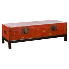 Chinese Vintage Red Lacquered Trunk on Black Base with Gilded Chinoiserie Décor