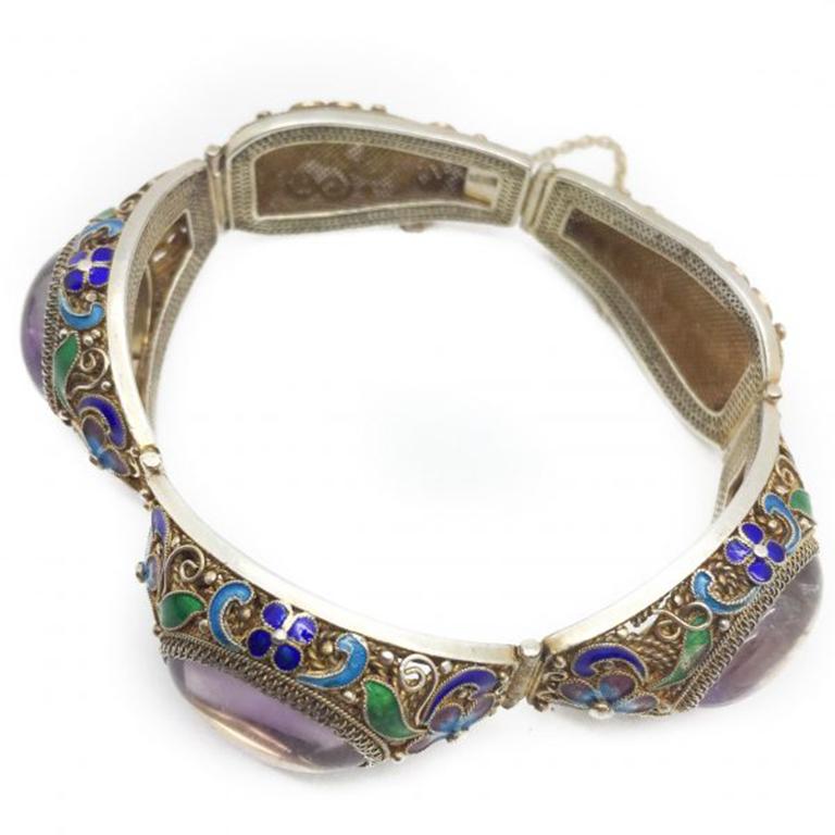 A stunning piece of Chinese jewellery made in the early part of the 20th Century, circa 1920. This style of Chinese Silver bracelet was typically made for the Chinese export market. As interest and intricate for the East grew there was growing
