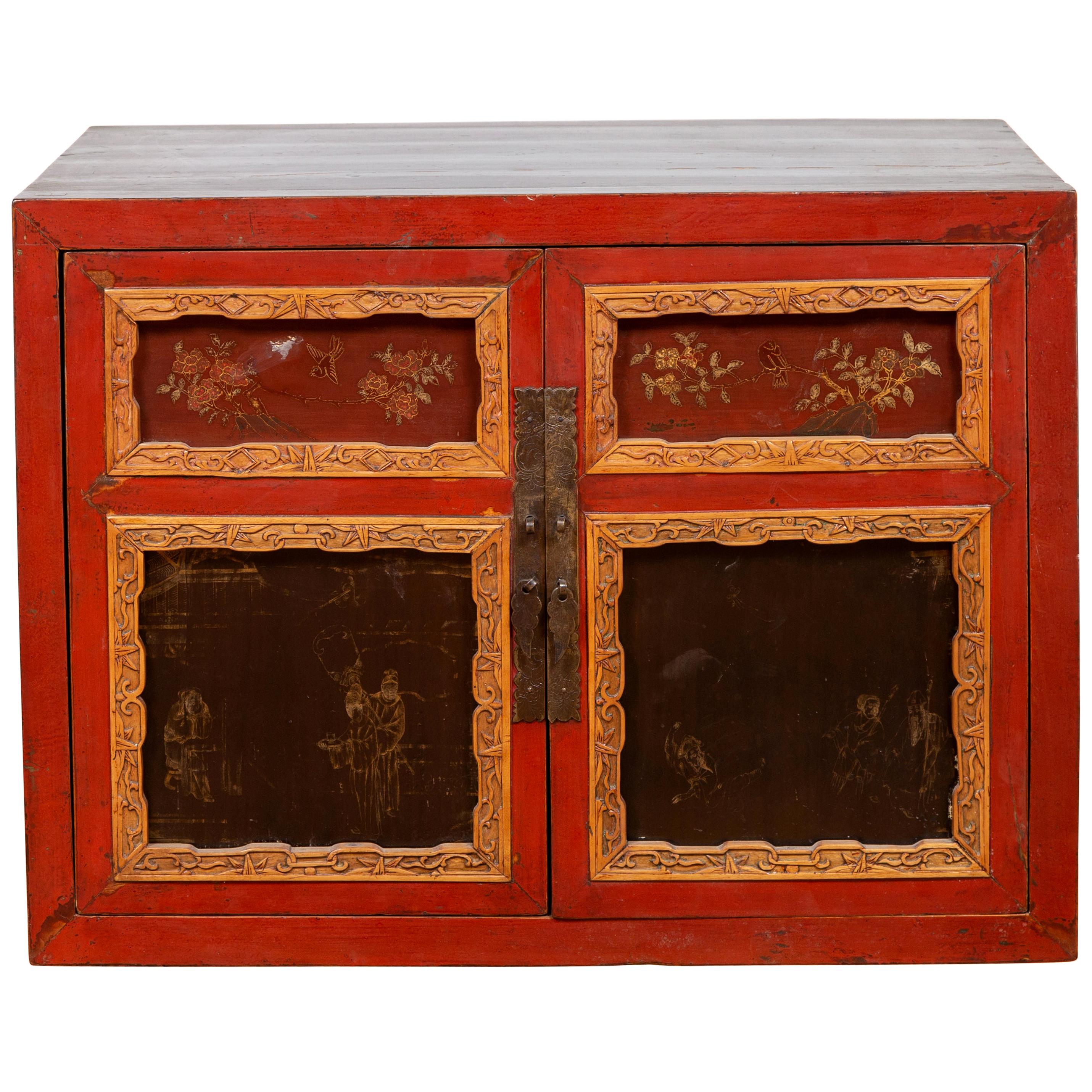 Chinese Vintage Small Red Lacquered Cabinet with Carved and Hand Painted Motifs