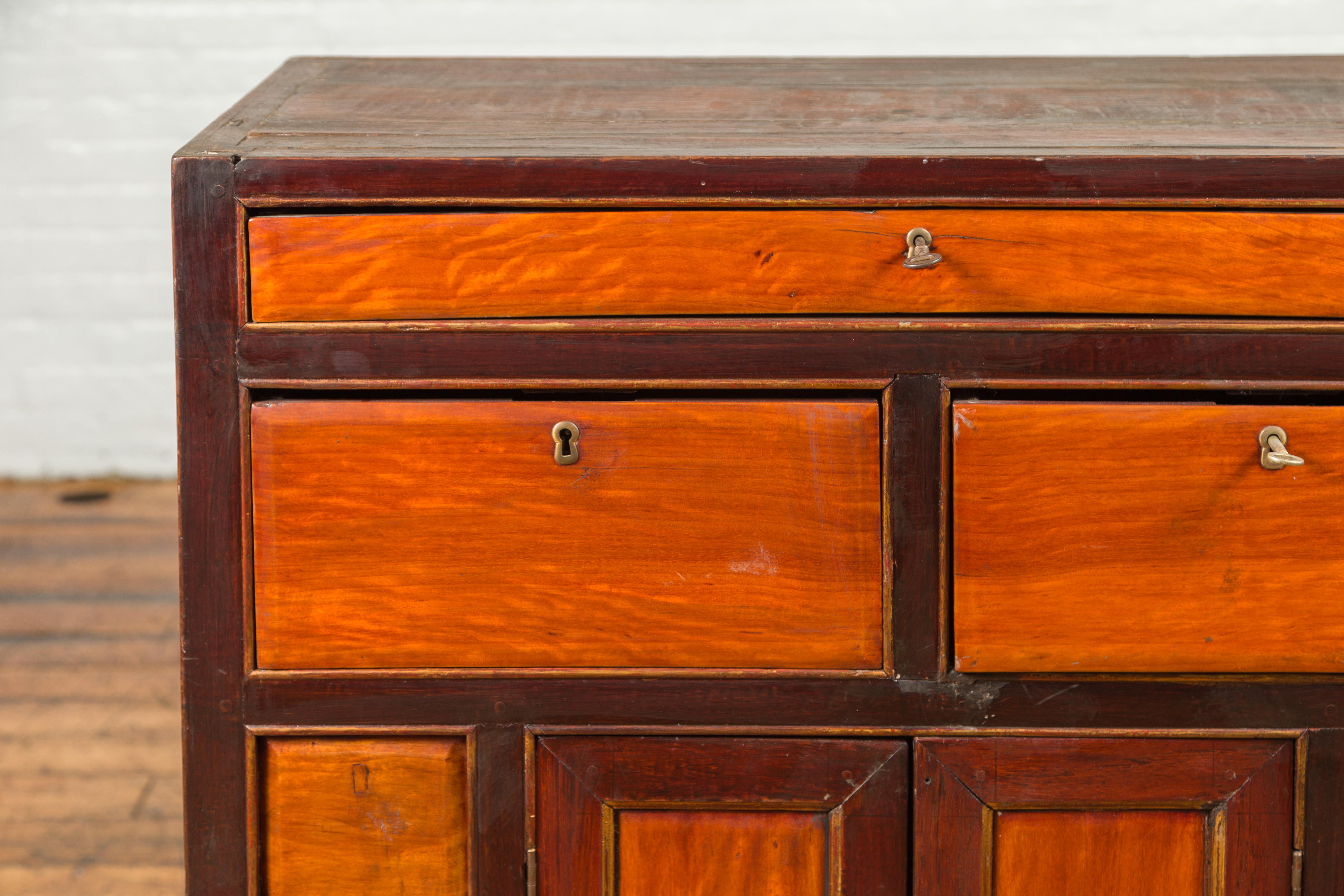 20th Century Chinese Vintage Two-Toned Side Chest with Drawers, Doors and Scrolled Feet