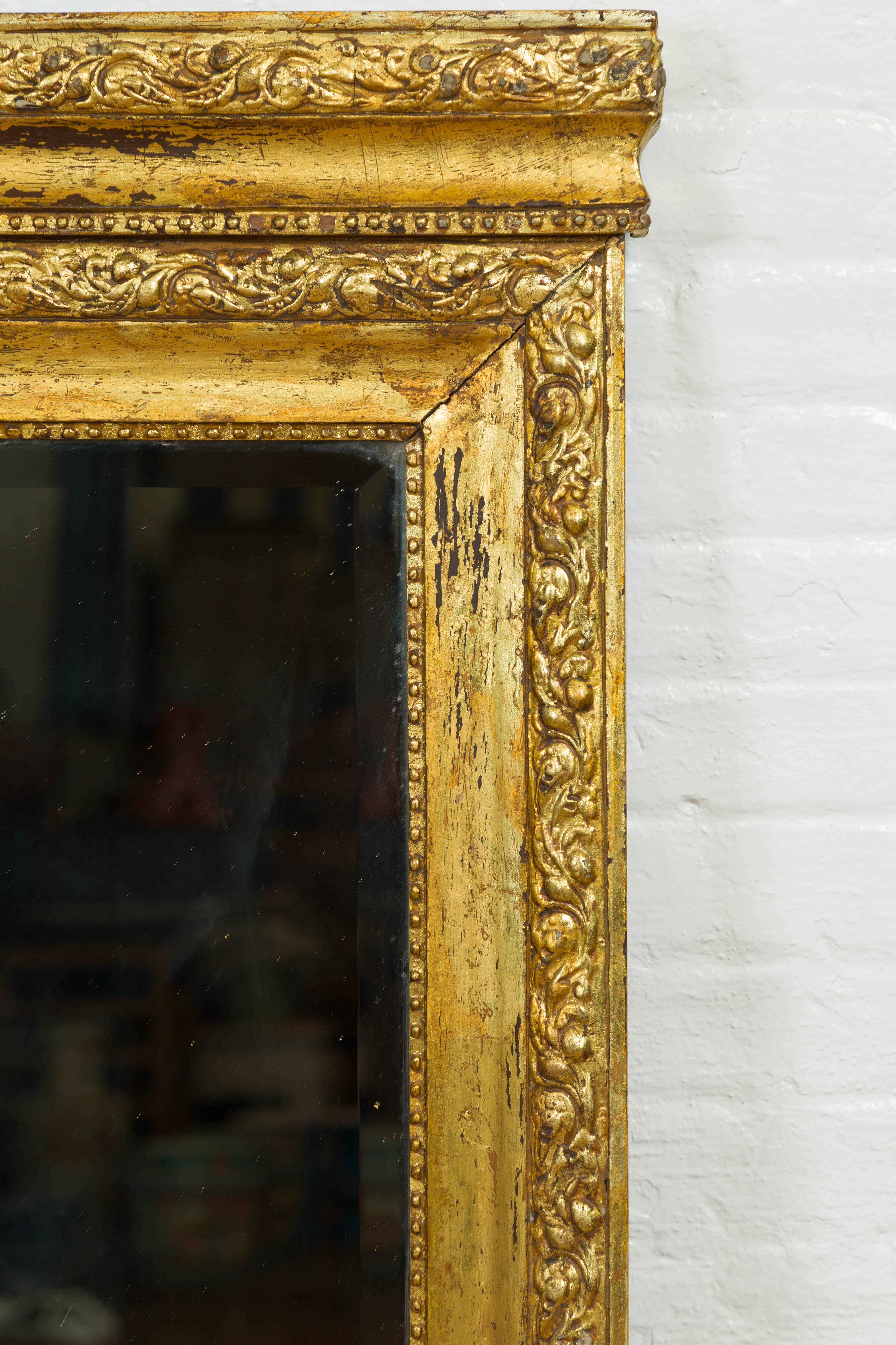 20th Century Chinese Vintage Vertical Giltwood Mirror with Carved Scrolling Foliage and Beads