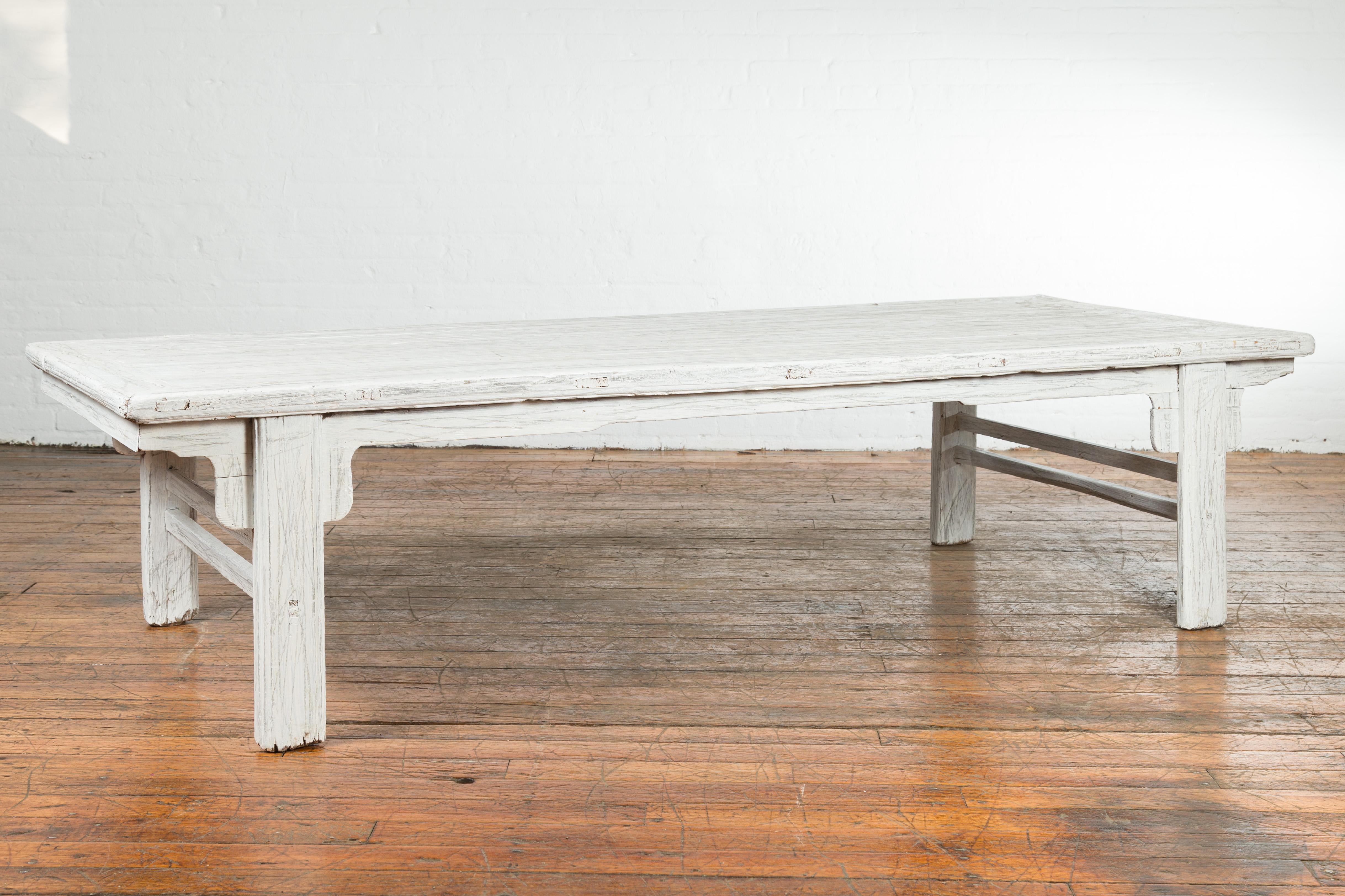 Painted Chinese Vintage Whitewashed Coffee Table with Carved Spandrels and Stretchers For Sale