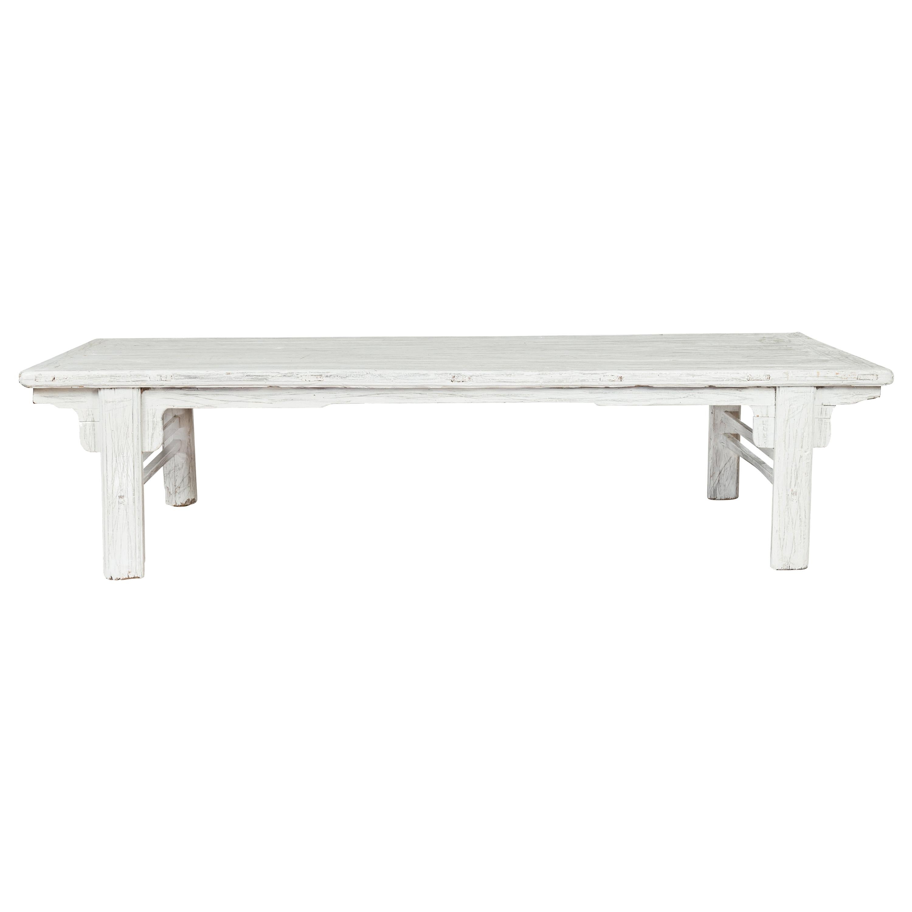 Chinese Vintage Whitewashed Coffee Table with Carved Spandrels and Stretchers For Sale