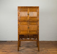 Chinese Vintage Wood and Bamboo Cabinet with Double Doors and Openwork Apron