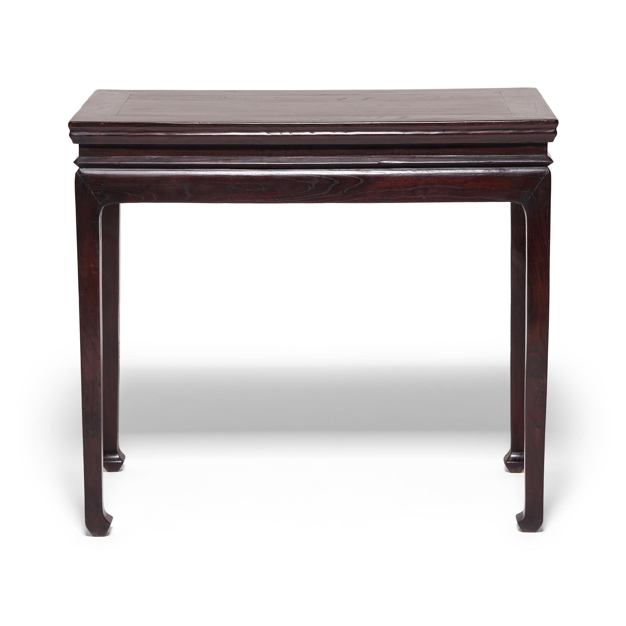 A tradition dating back to the northern Song dynasty, wine tables have been used for centuries at social gatherings as a spot to converse, sip wine, and make toasts. This 19th-century elmwood table celebrates this time-honored tradition with a