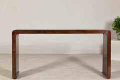 Chinese Waterfall Console Table in Dark Wood with Scrolling Ends, circa 1900