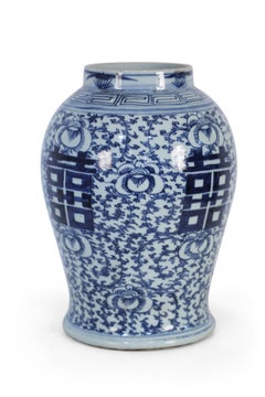 Chinese White and Blue Character and Floral Urn