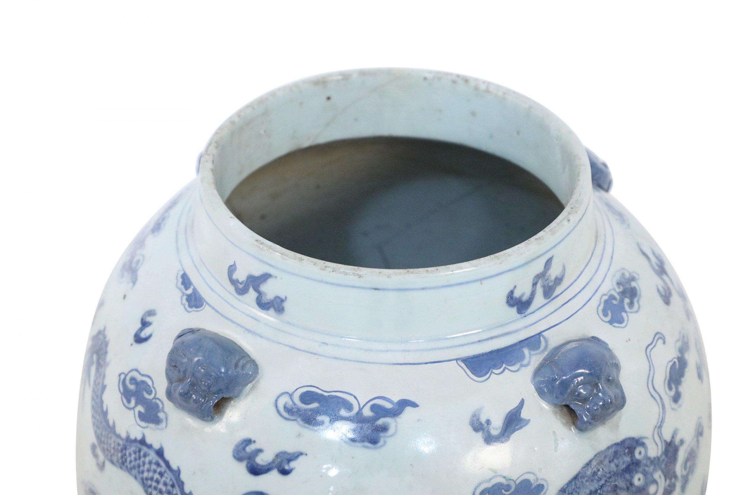 Chinese Export Chinese White and Blue Dragon Motif Porcelain Floor Urn For Sale