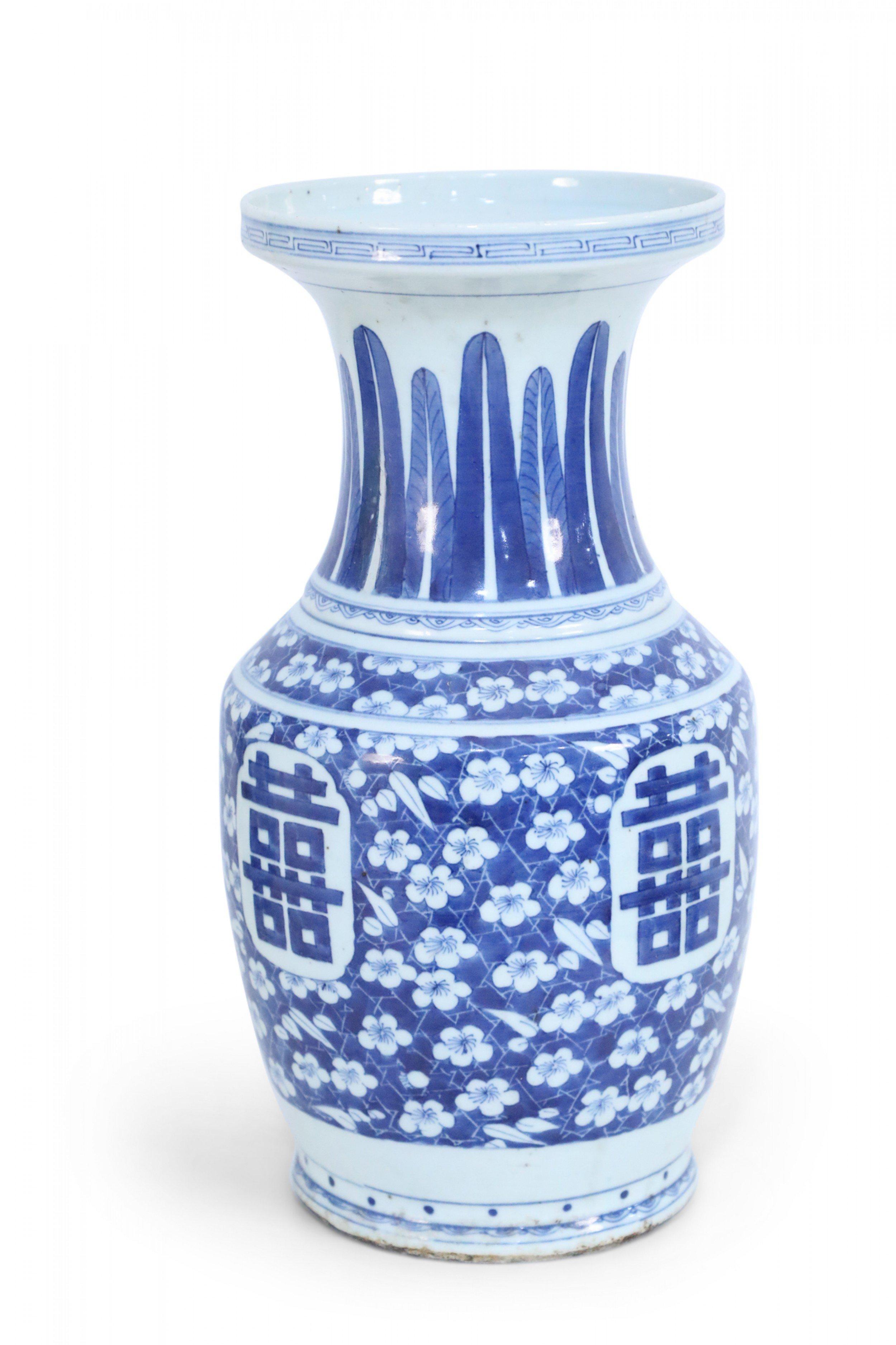 Chinese Export Chinese White and Blue Feather and Floral Motif Porcelain Urn For Sale