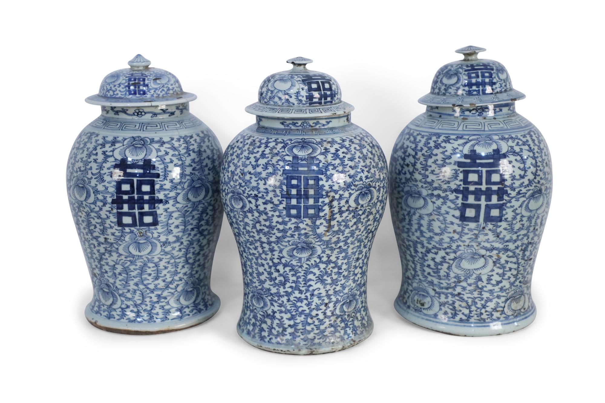 Chinese Export Chinese White and Blue Floral Lidded Urns