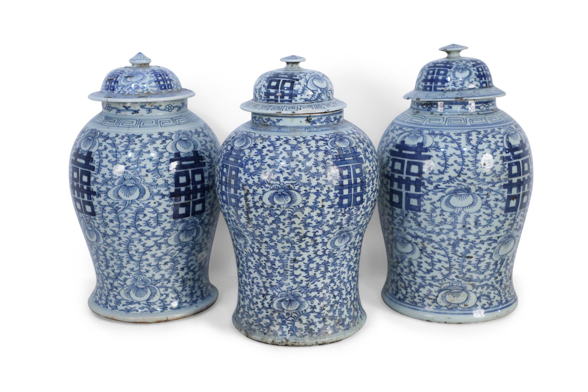 Chinese White and Blue Floral Lidded Urns In Good Condition In New York, NY
