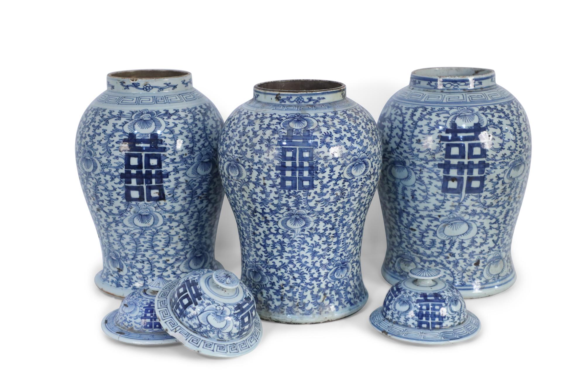 19th Century Chinese White and Blue Floral Lidded Urns