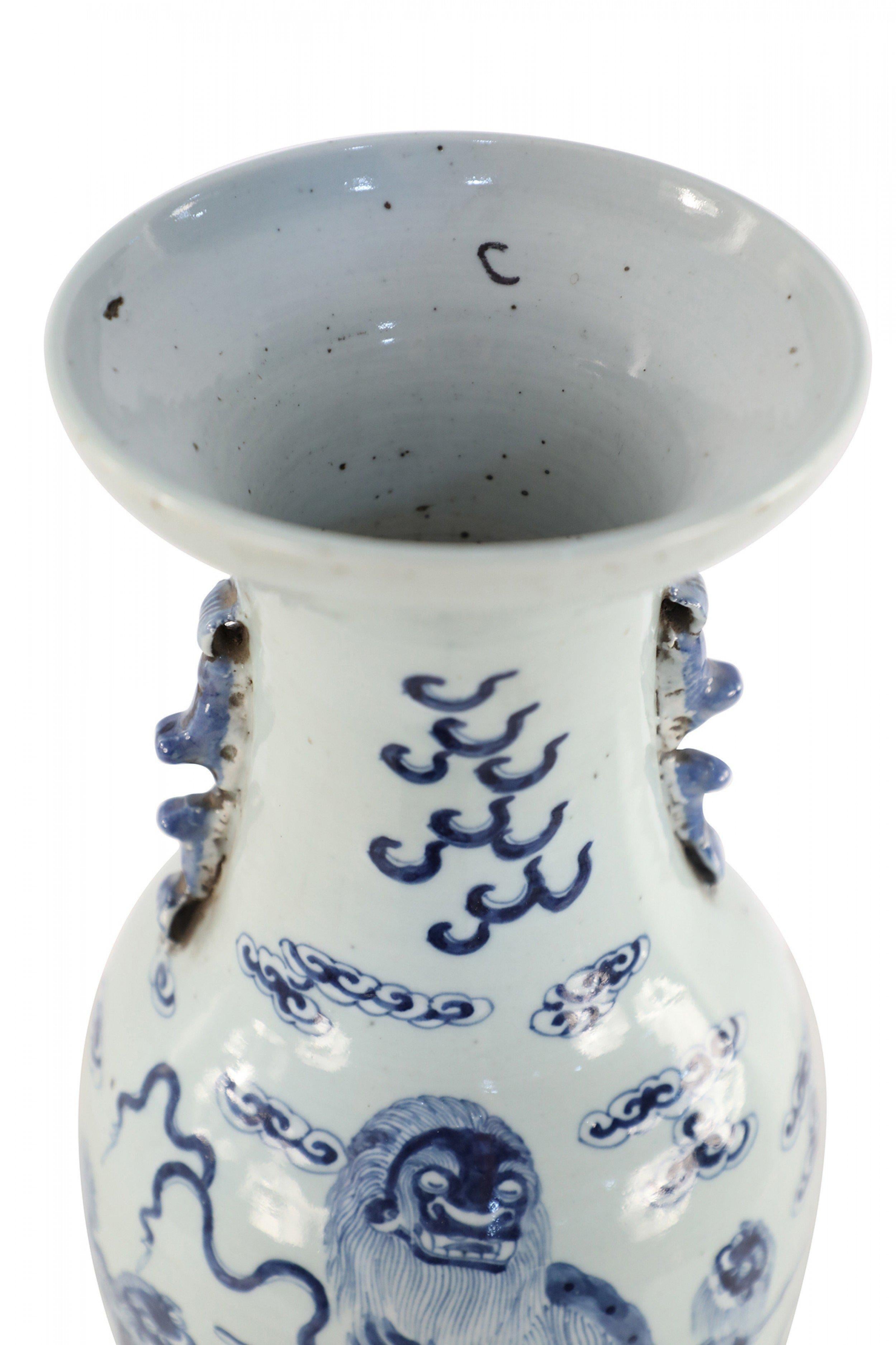 Chinese White and Blue Foo Dog and Serpent Design Porcelain Urn For Sale 2