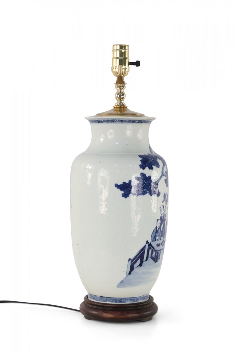 Chinese White and Blue Gaming Scene Table Lamp In Good Condition For Sale In New York, NY