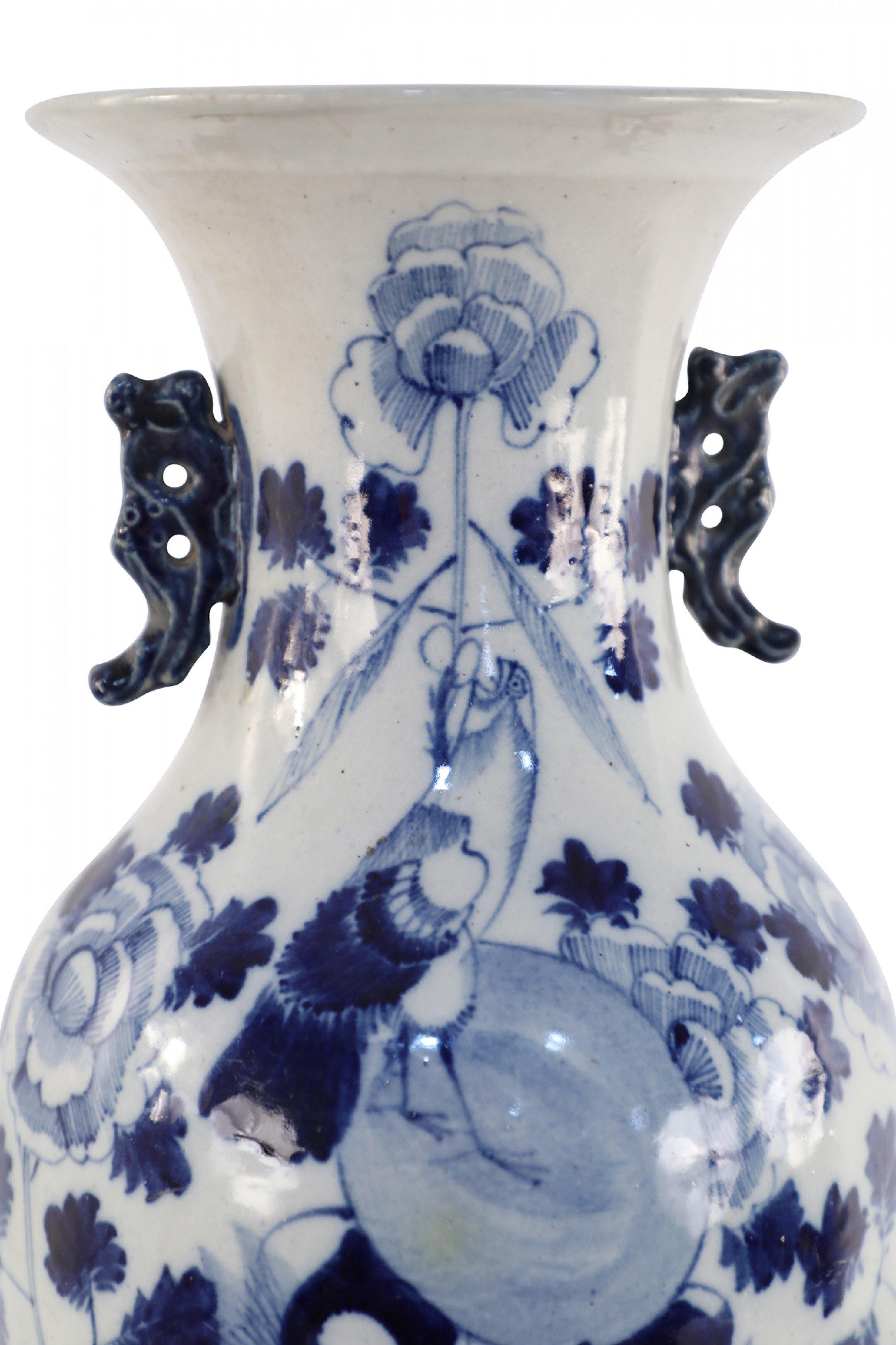white pottery with blue design